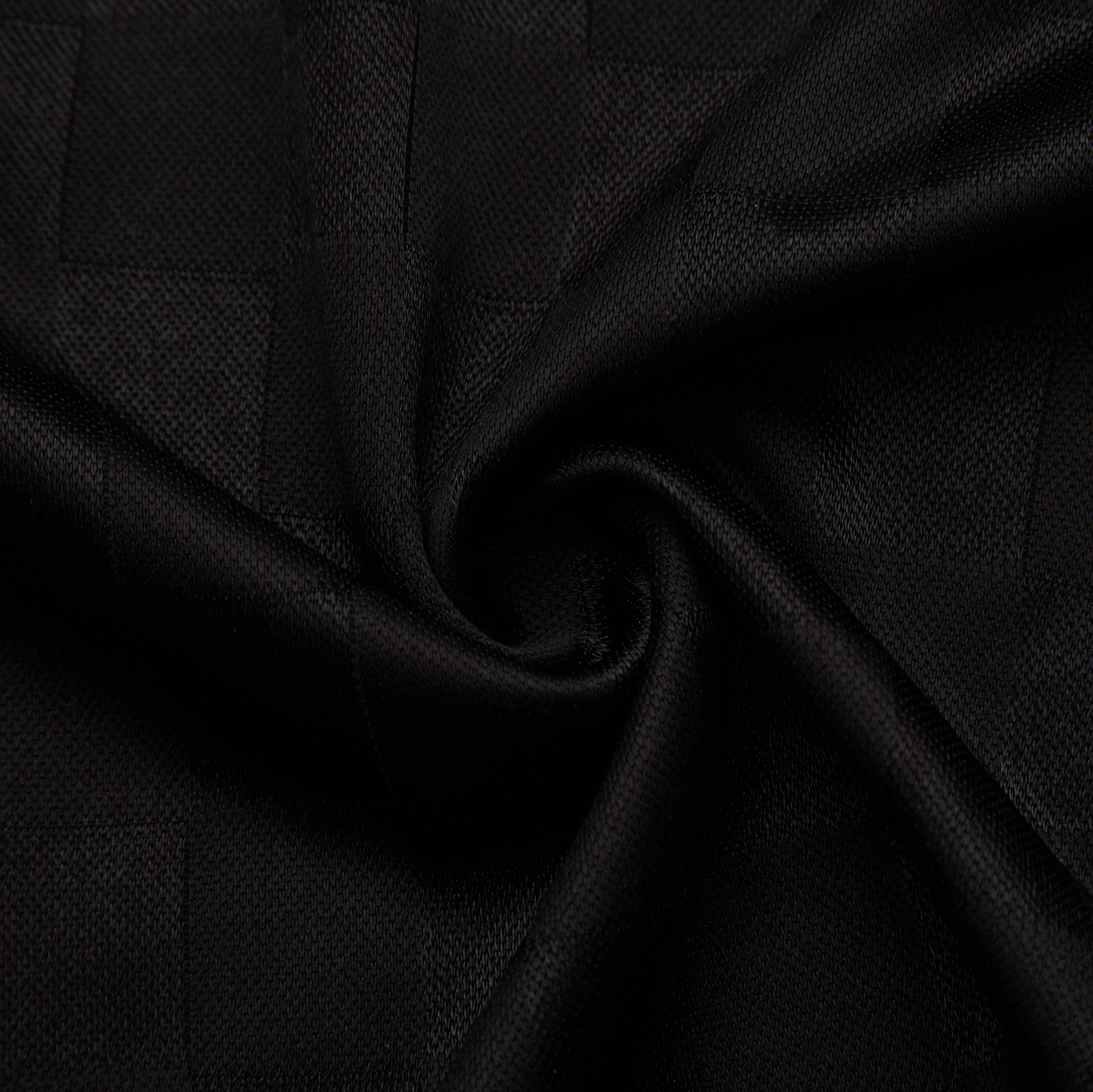 Close-up of black fabric with a subtle texture