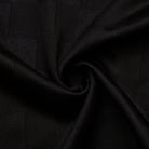 Close-up of black fabric with a subtle texture