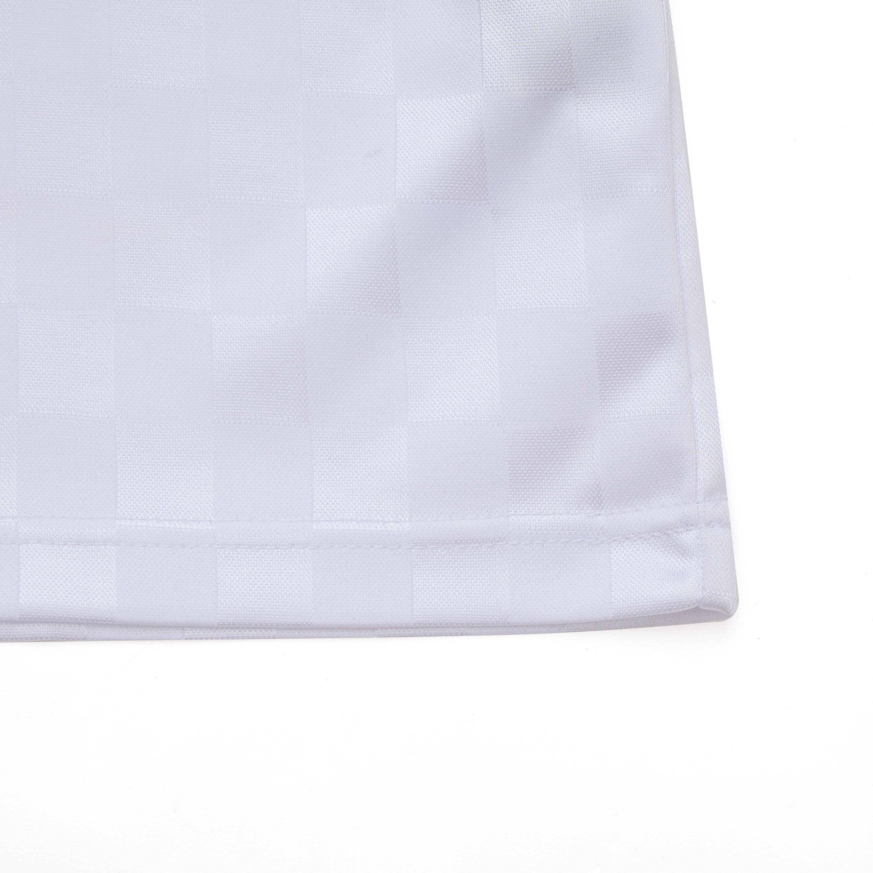 Close-up of a white fabric texture on a white background