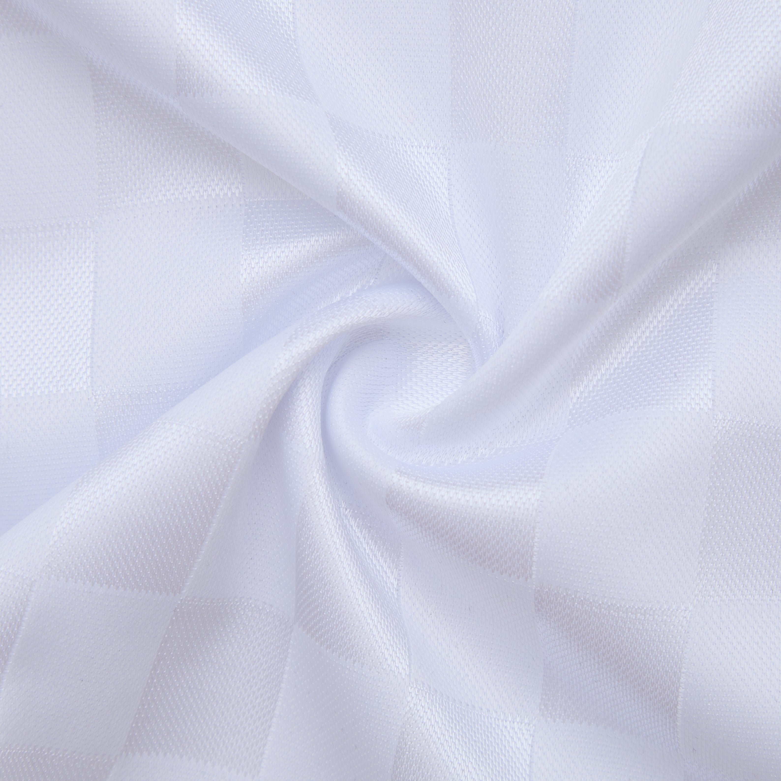 Close-up of white fabric with subtle texture