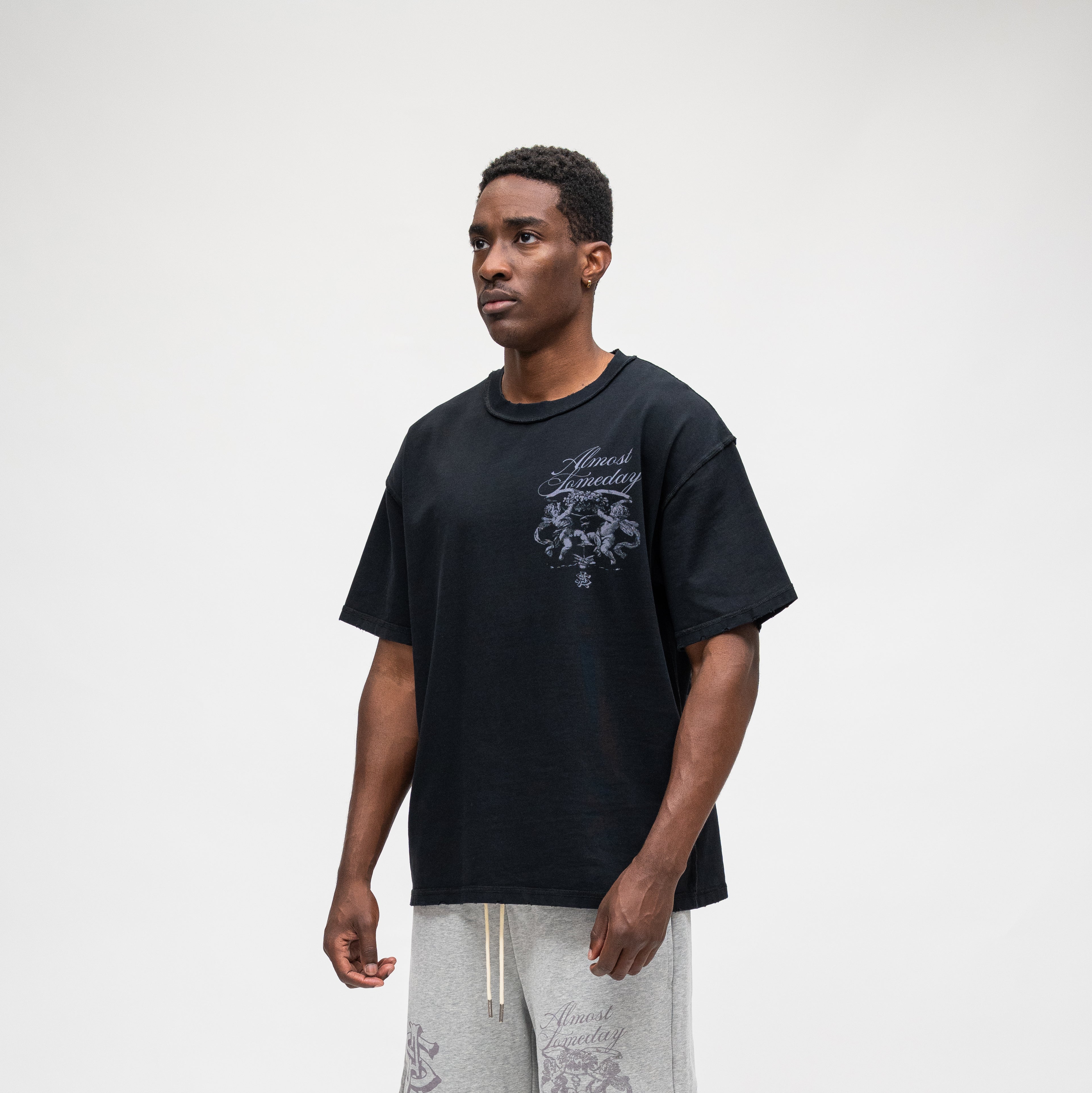 ALMOST SOMEDAY Flourish Tee in Black, detail view