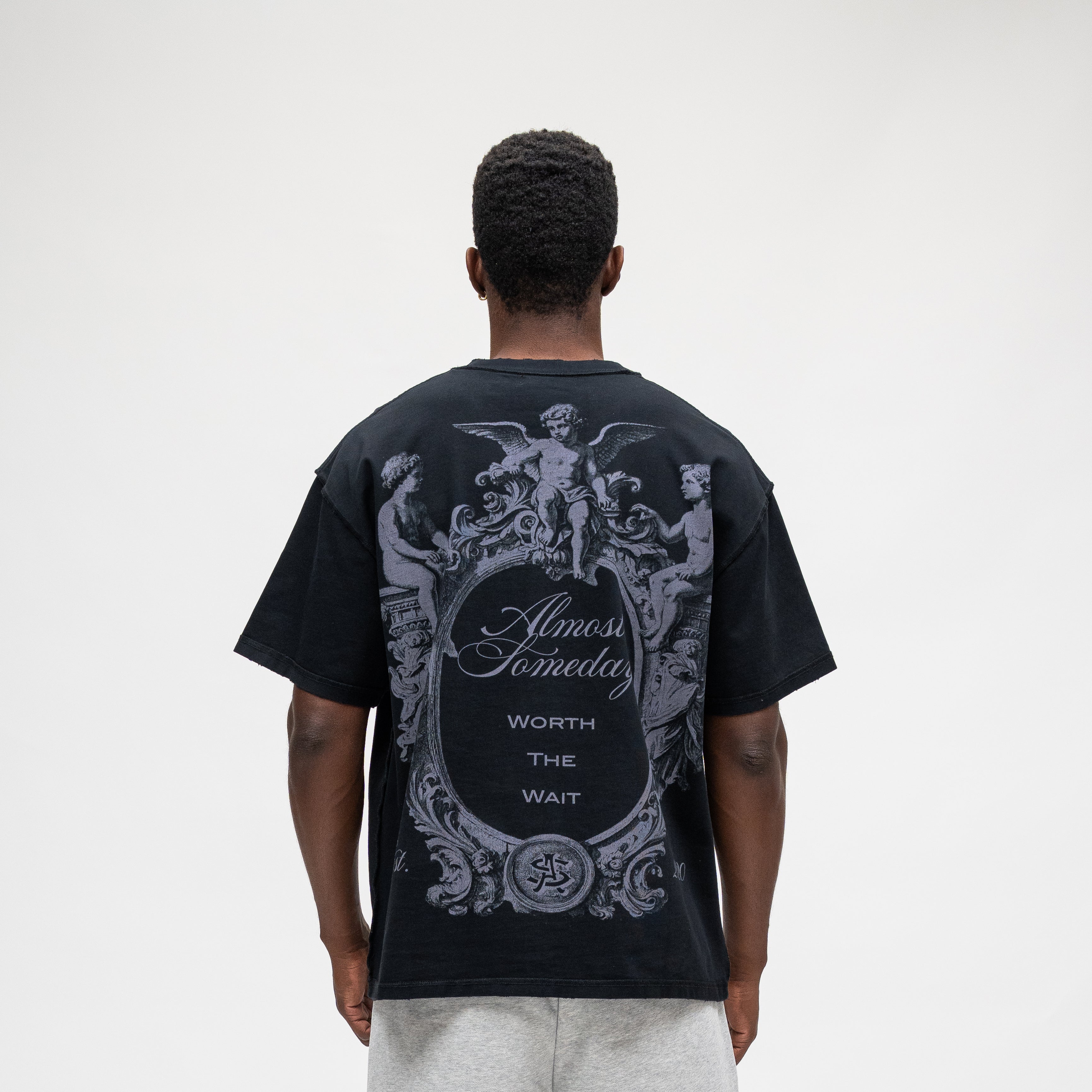 ALMOST SOMEDAY Flourish Tee in Black, back view