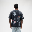 ALMOST SOMEDAY Gallery Tee in Black, back view with The Almost Room, Art of Not Explaining, and Enjoy The Silence text graphics