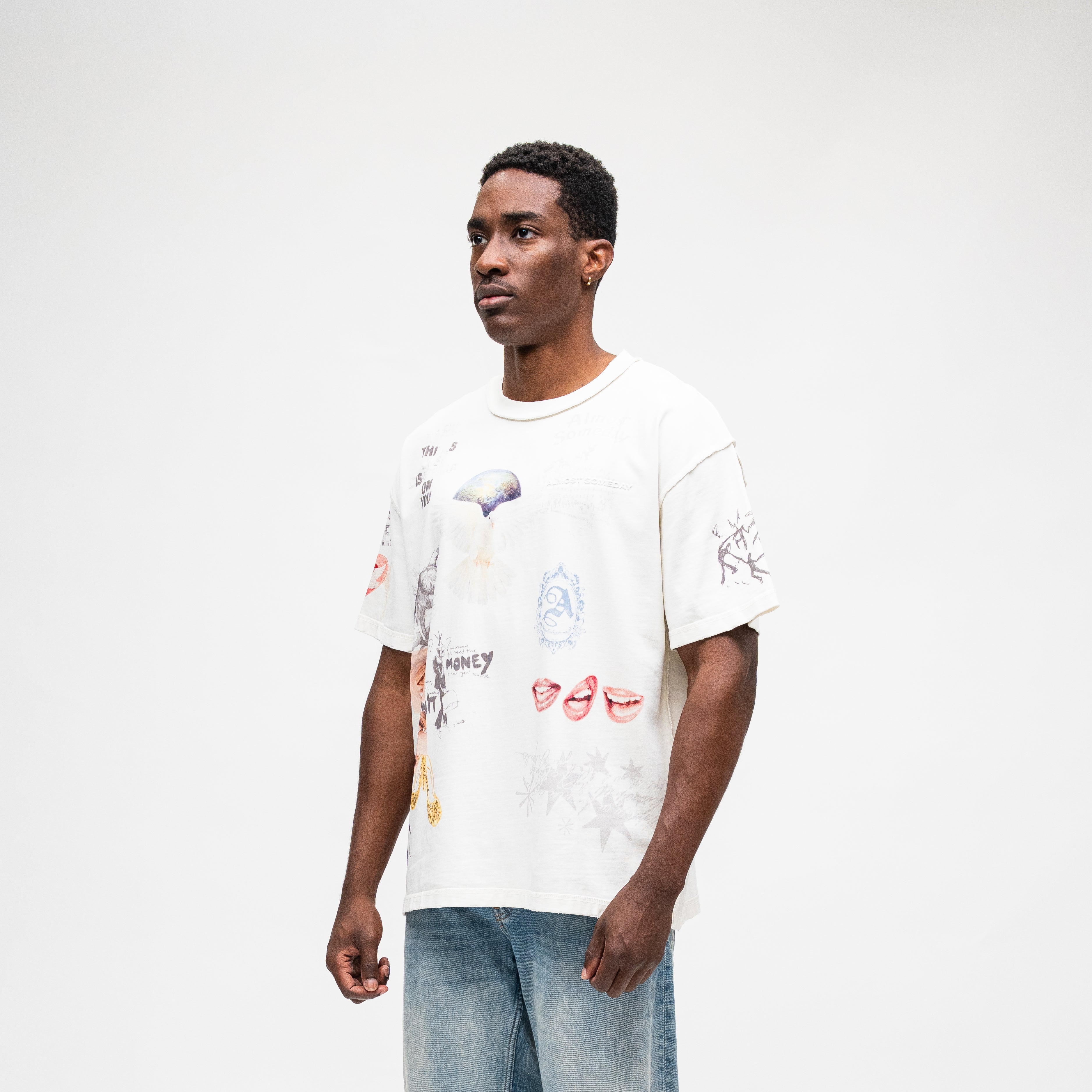 ALMOST SOMEDAY Gallery Tee in Cream, angled front view showing collage print detail and sleeve graphic