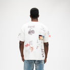 ALMOST SOMEDAY Gallery Tee in Cream, back view with collage print including Almost Show Room, Art of Not Explaining, and Enjoy The Silence text graphics
