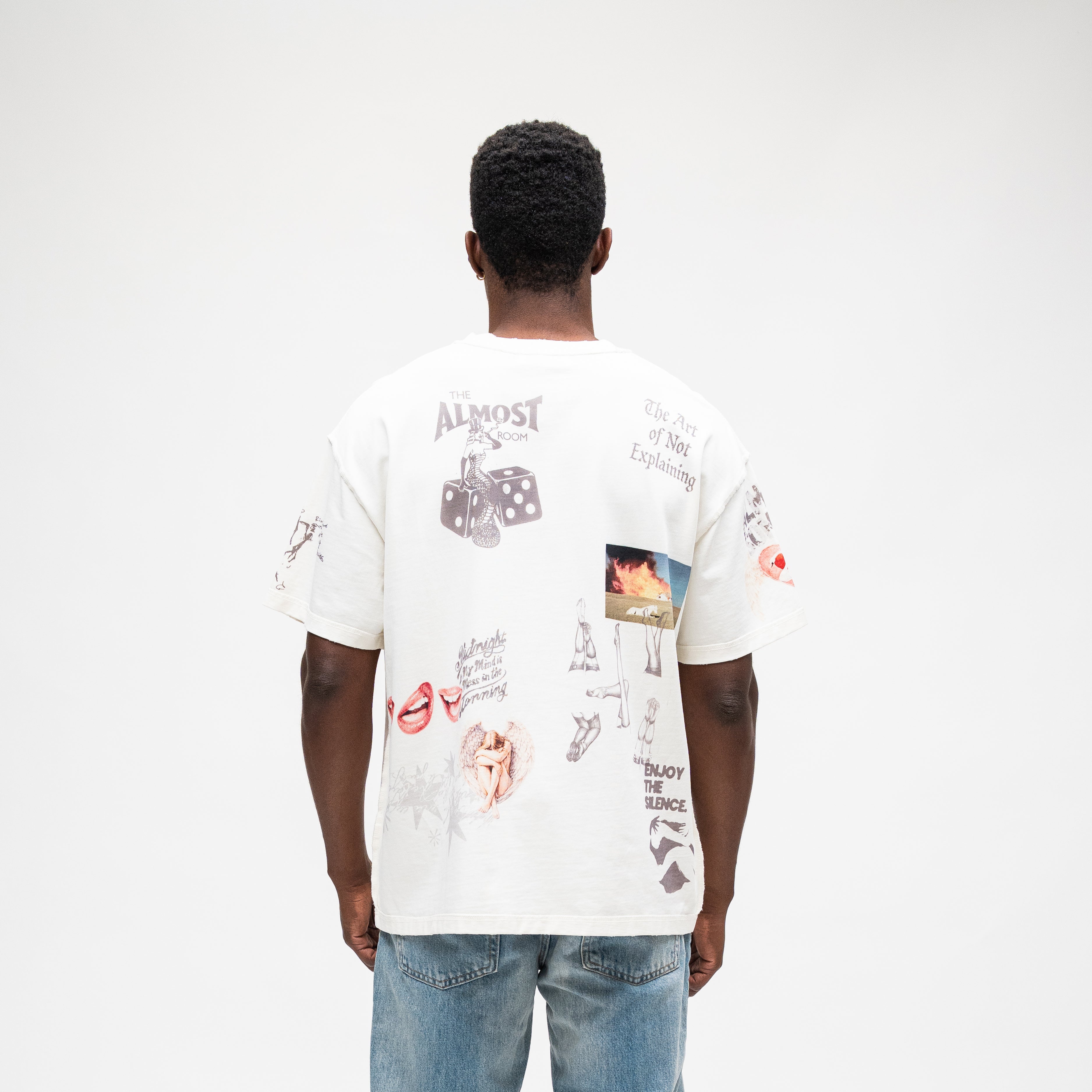 ALMOST SOMEDAY Gallery Tee in Cream, back view with collage print including Almost Show Room, Art of Not Explaining, and Enjoy The Silence text graphics