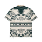 Short-sleeve shirt with a pattern and text on a white background