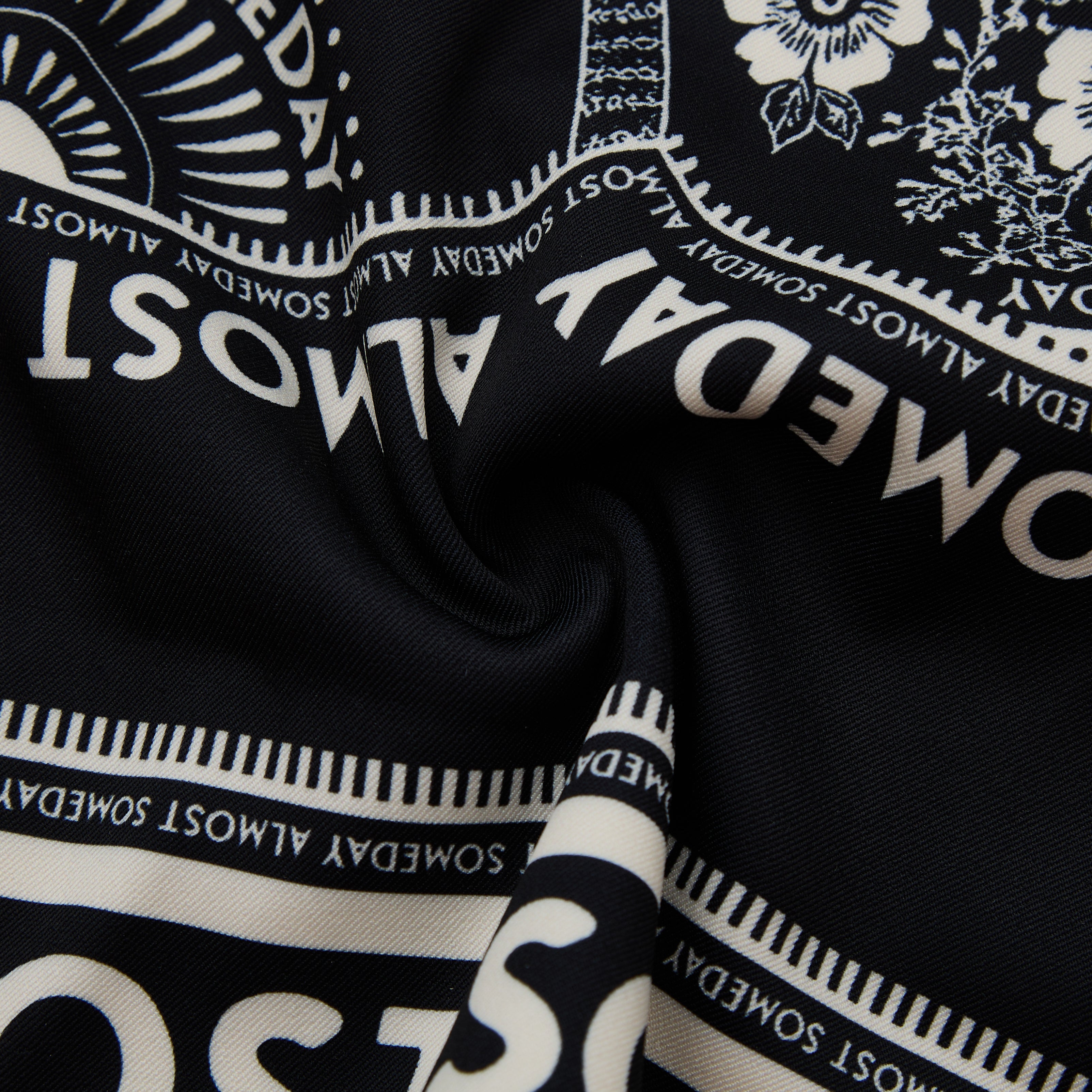 Black fabric with white text and patterns, featuring 'ALMOST SOMEDAY' design.
