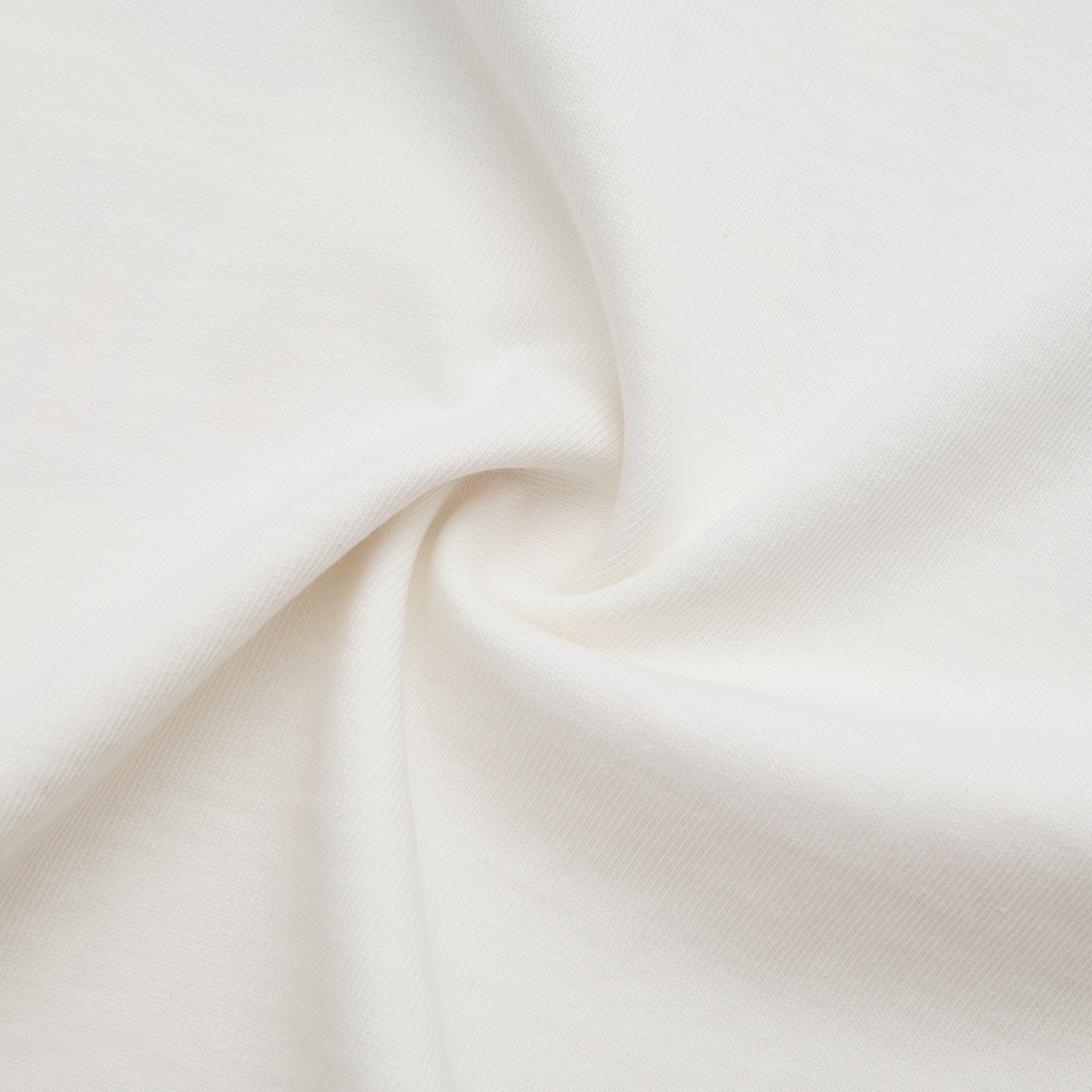 Close-up of beige fabric with a subtle texture