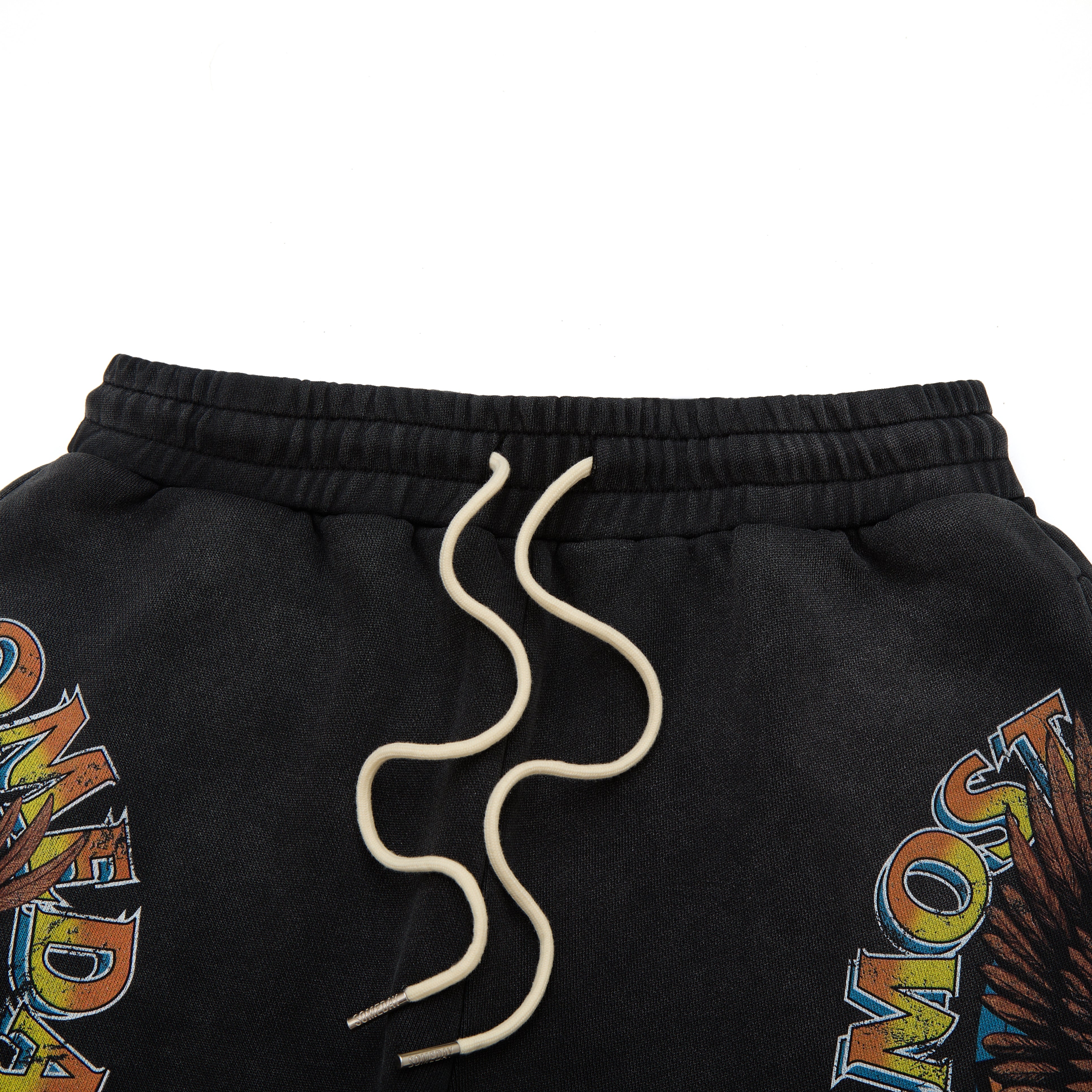 Black sweatshorts with colorful text and a snake-like drawstring on a white background