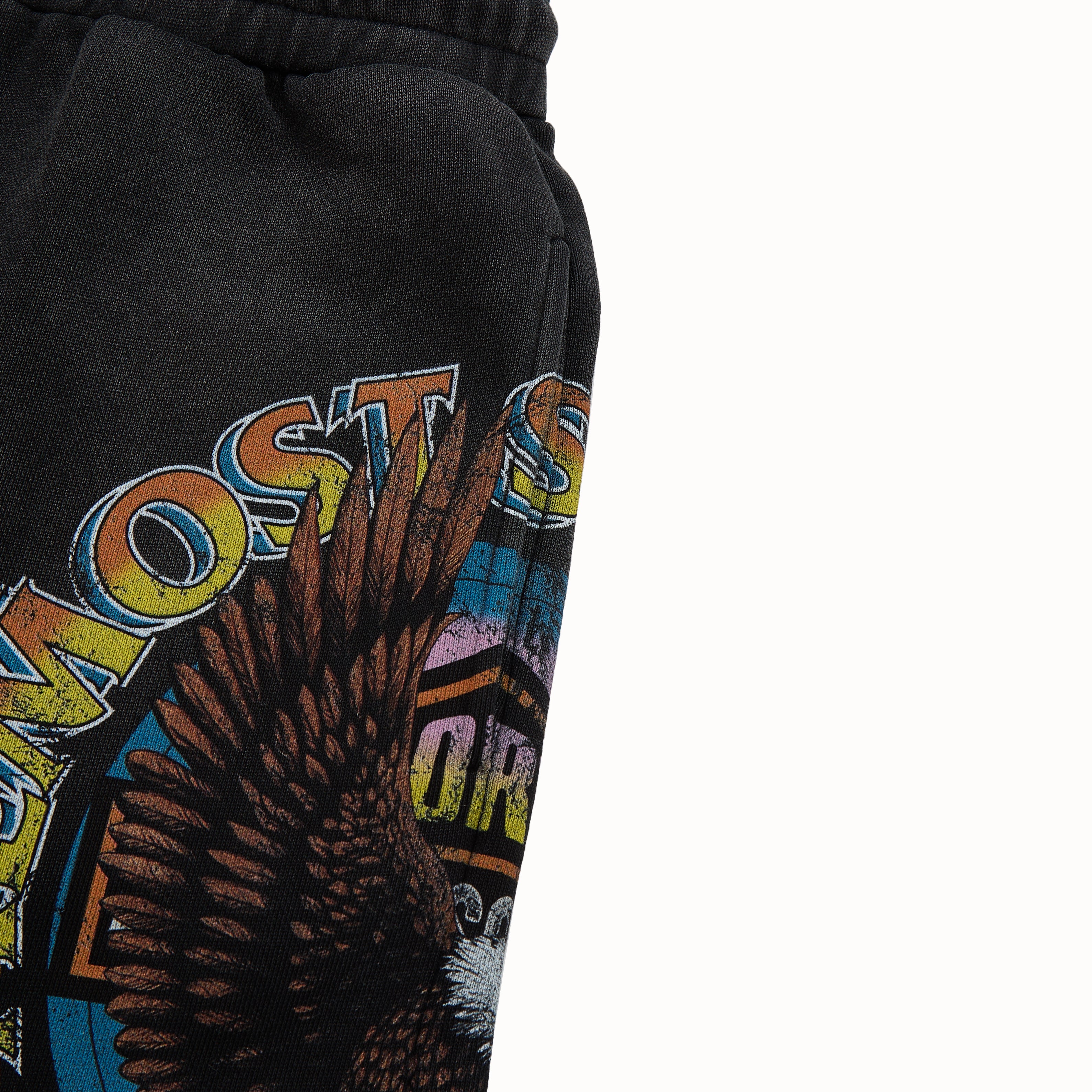 Black sweatshorts with colorful graphic design on a white background