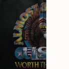 Black sweatshorts with colorful eagle graphic and text on a white background