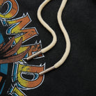 Close-up of a cord on a colorful graphic background