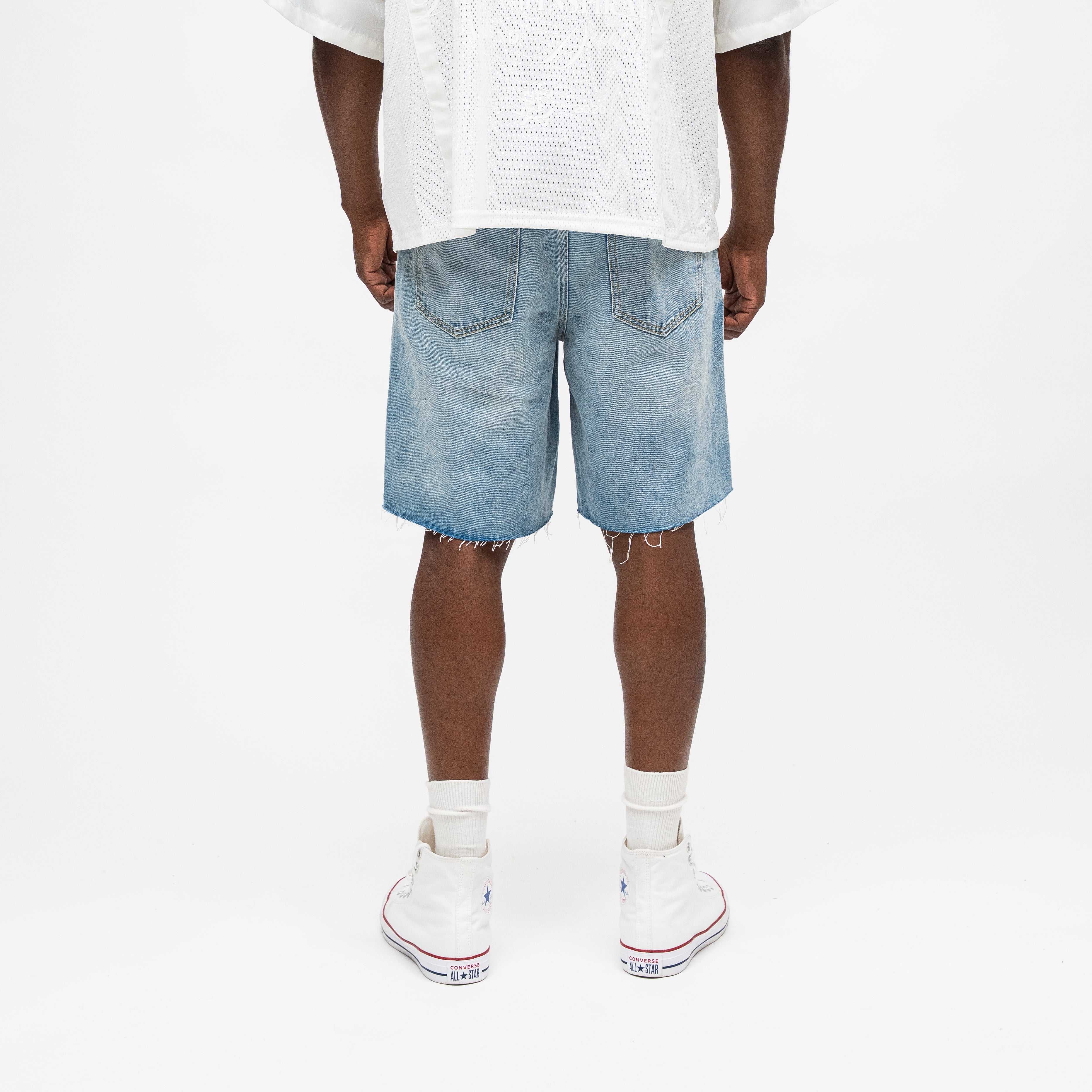 ALMOST SOMEDAY Letterman Denim Jort in Blue Wash, back view showing 5-pocket construction and subtle distressing