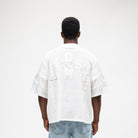 ALMOST SOMEDAY Letterman Jersey Top in Cream, back view with large tonal Almost Someday block letter appliqué across upper back