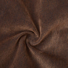 Close-up of brown fabric with a subtle pattern