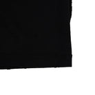 Close-up of black fabric corner on a white background