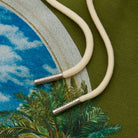 Close-up graphics with a floral pattern in the background