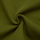 Close-up of olive green fabric with a textured pattern
