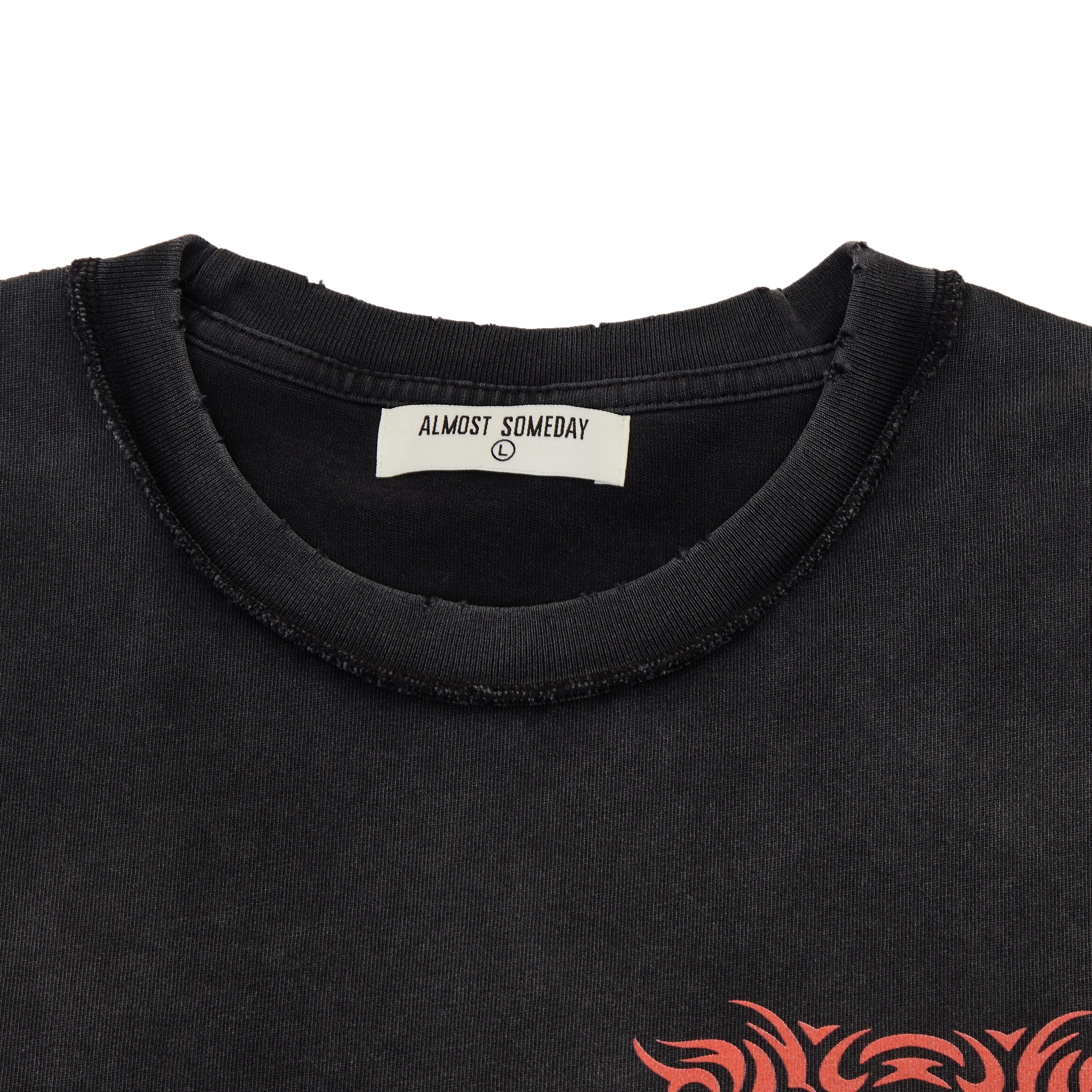 Black t-shirt with a red tribal design on the sleeve, featuring the brand 'Almost Someday'.