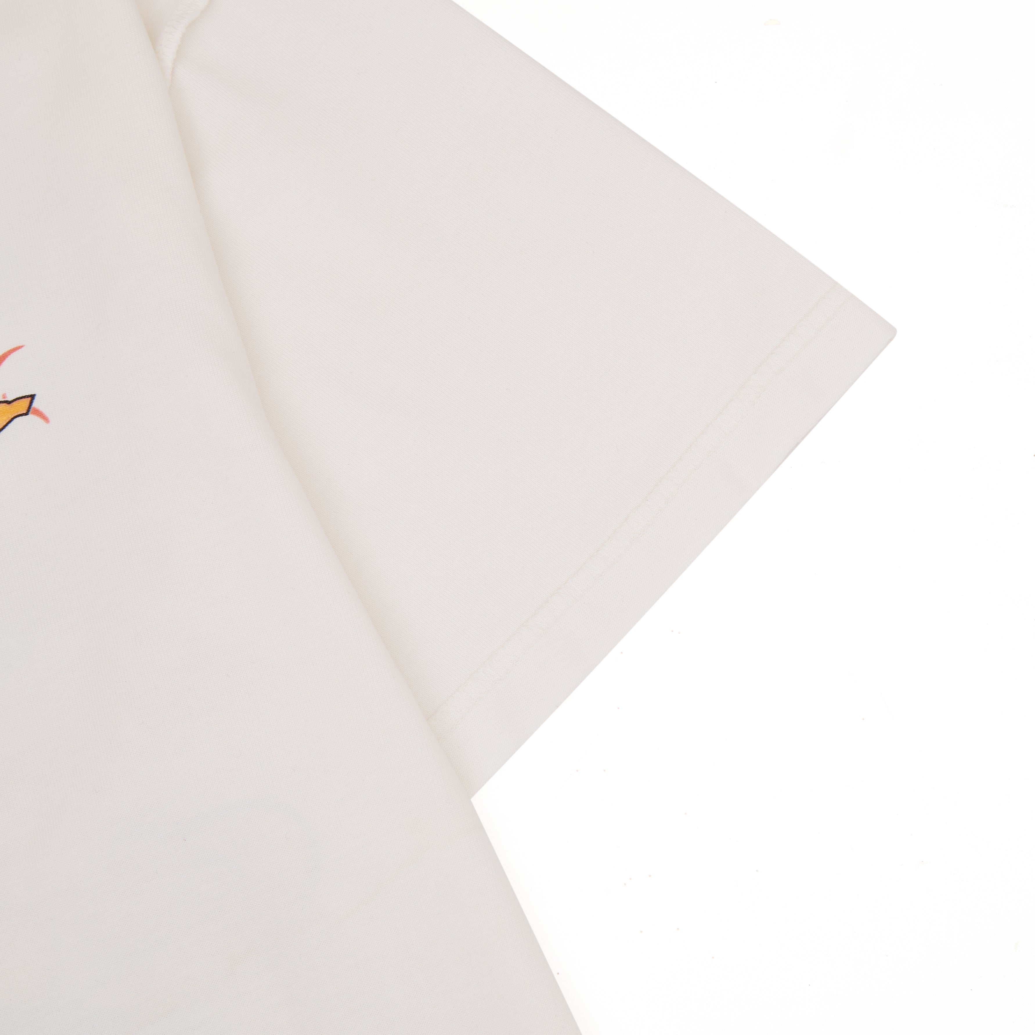 Close-up of a beige fabric with a subtle pattern on a white background