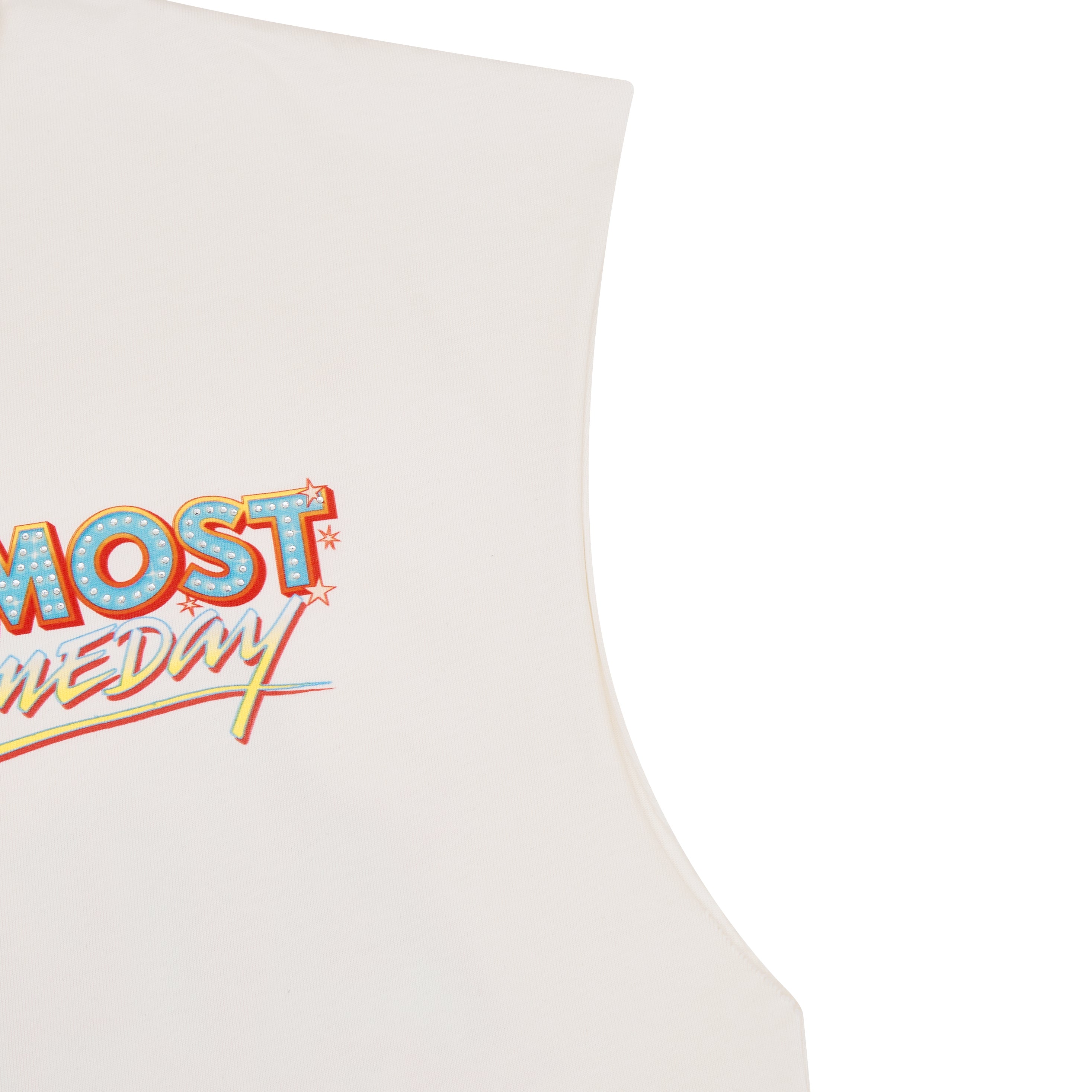 cream tank top with colorful text design on a white background