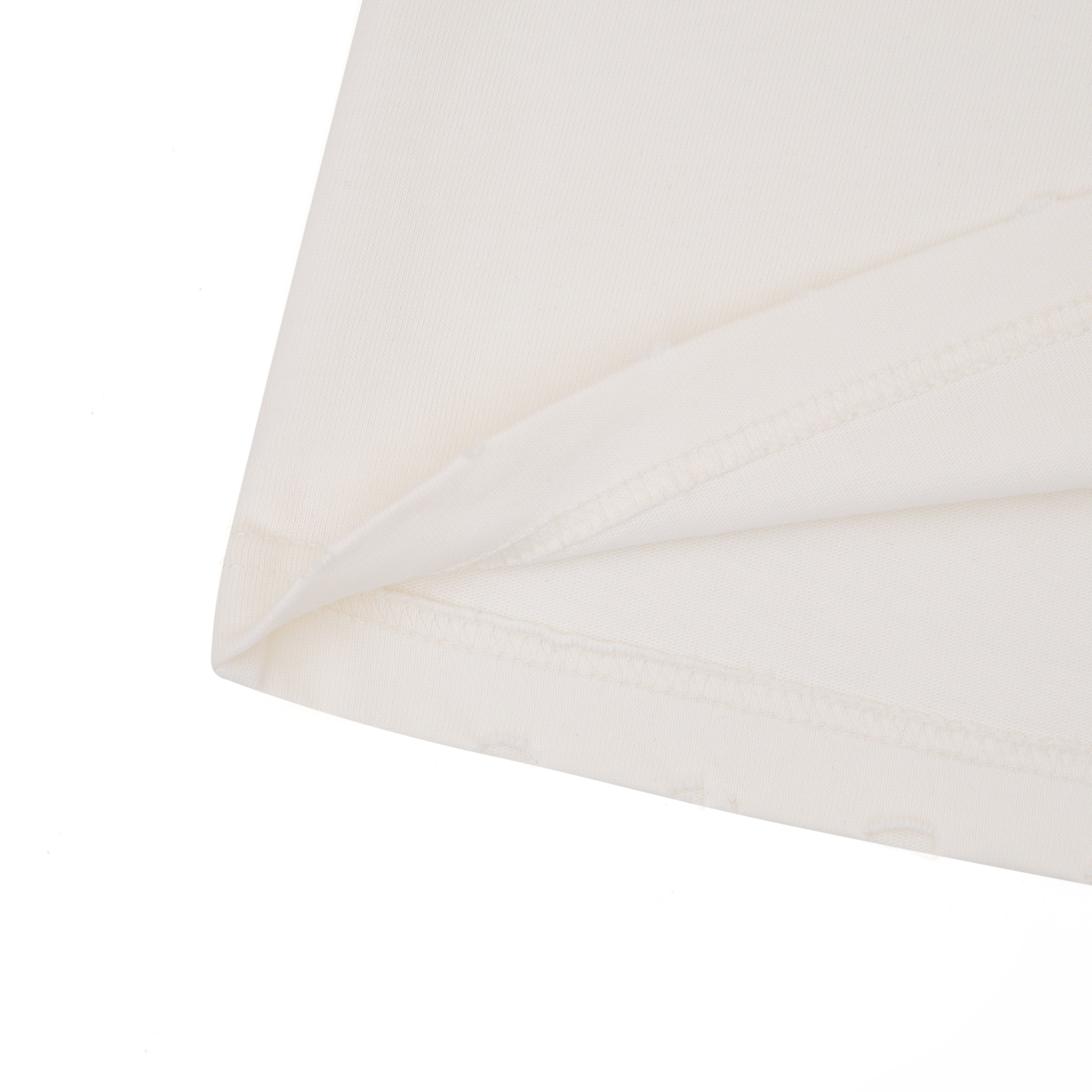 Close-up of a white lampshade on a white background