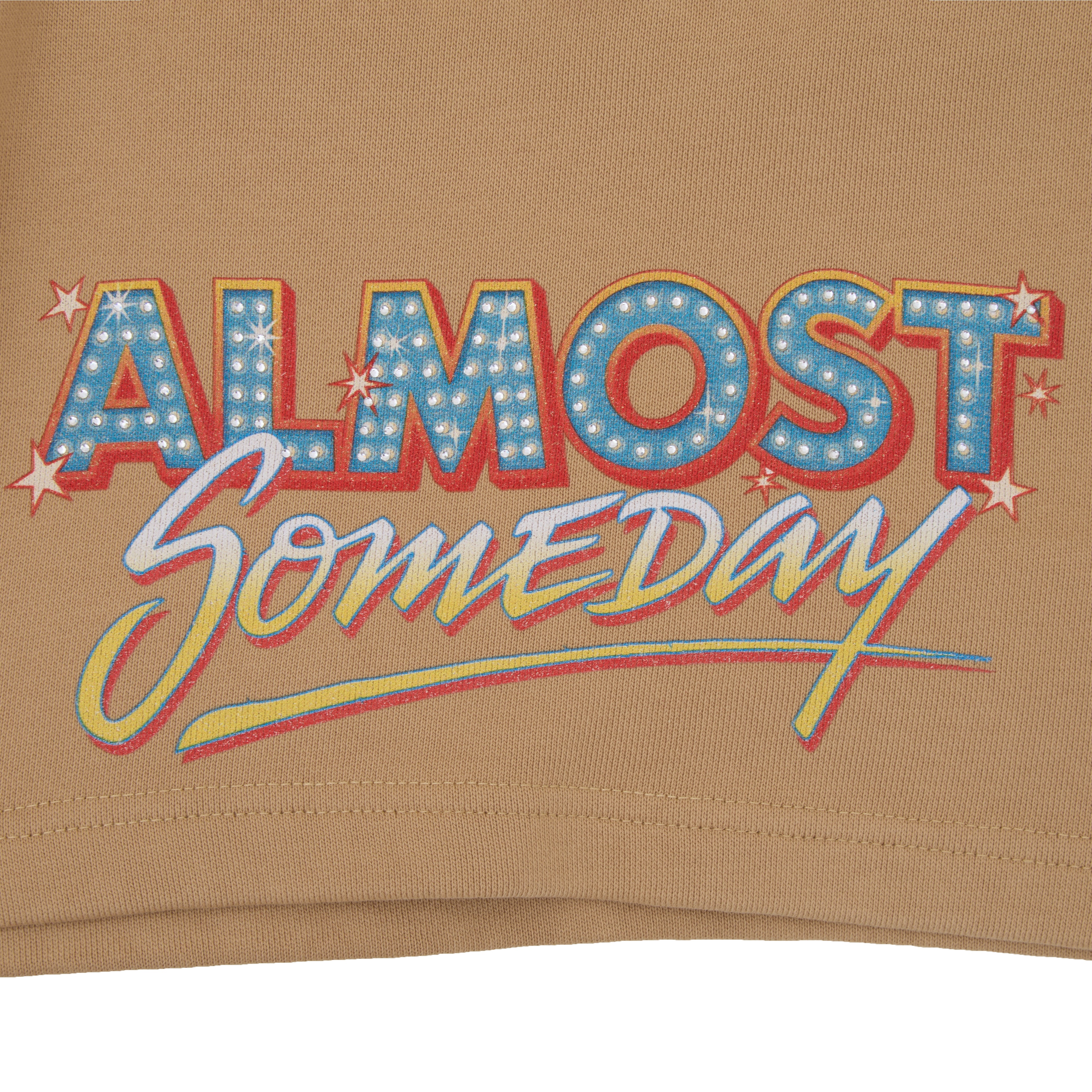 Text 'ALMOST Someday' on a beige background with decorative elements.