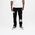 ALMOST SOMEDAY Vision Carpenter Pant in Black, front view with ornate thigh graphic and script leg print
