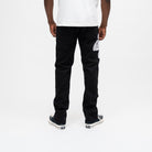 ALMOST SOMEDAY Vision Carpenter Pant in Black, back view showing large ornate graphic on right thigh and back pockets