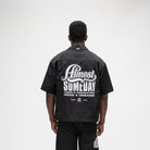 ALMOST SOMEDAY Vision Nylon Shirt in Black, back view with full-back Almost Someday graphic print
