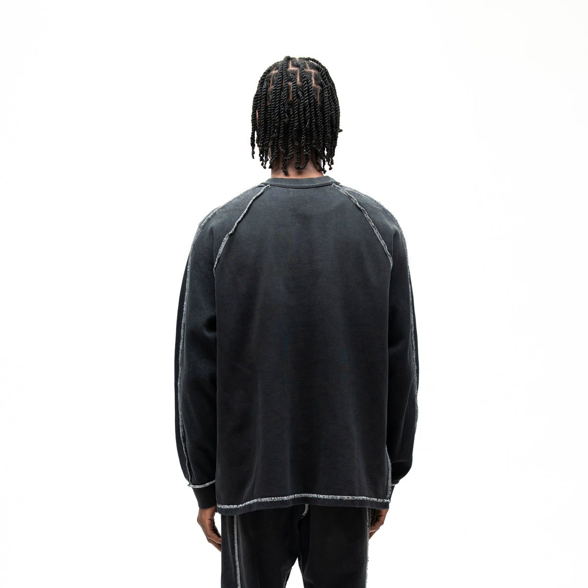 Alumni Crewneck – Black – Back view on model showing plain back and white contrast shoulder and hem stitching