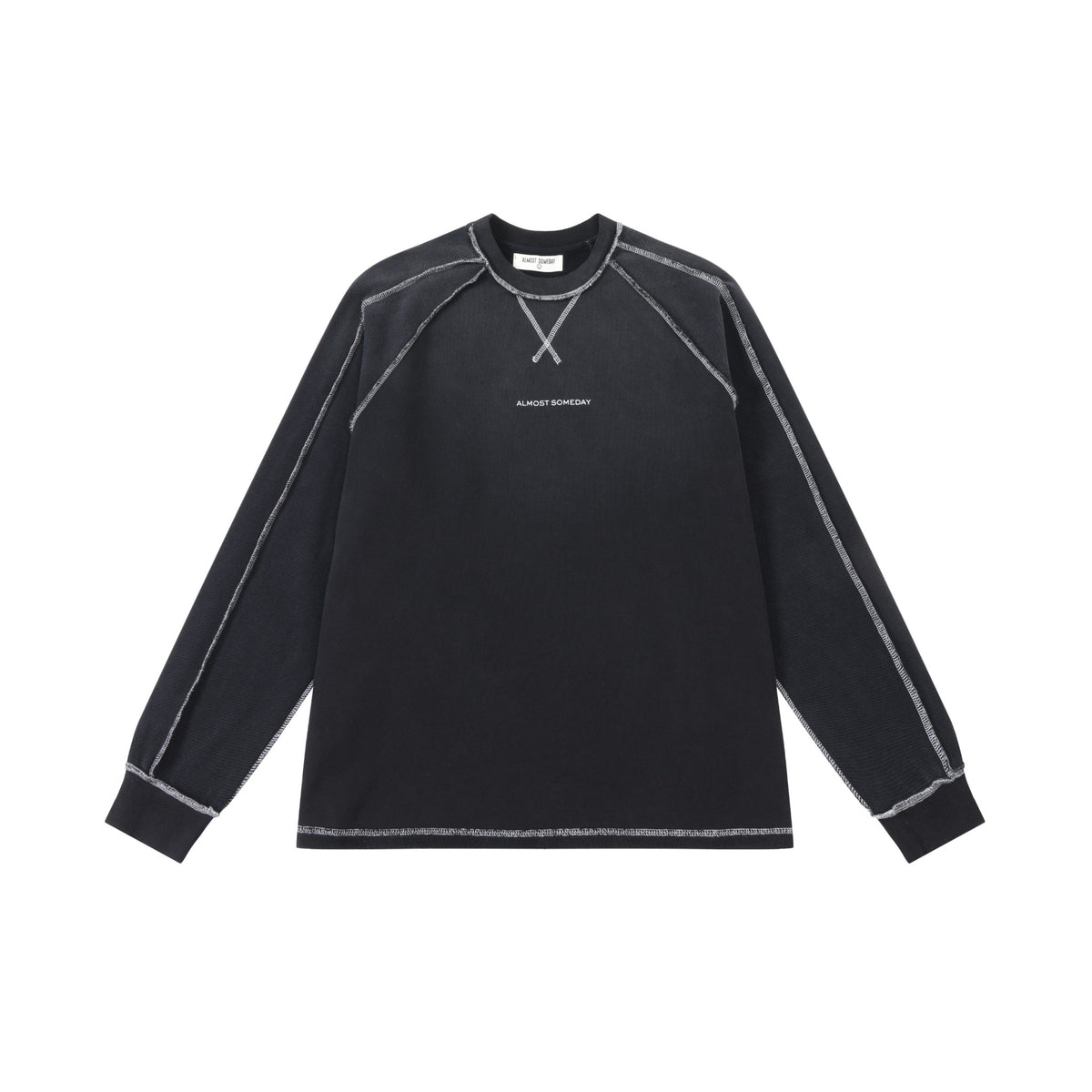 Alumni Crewneck – Black – Front flat lay showing chest logo, crossed neckline stitching, and contrast sleeve seams