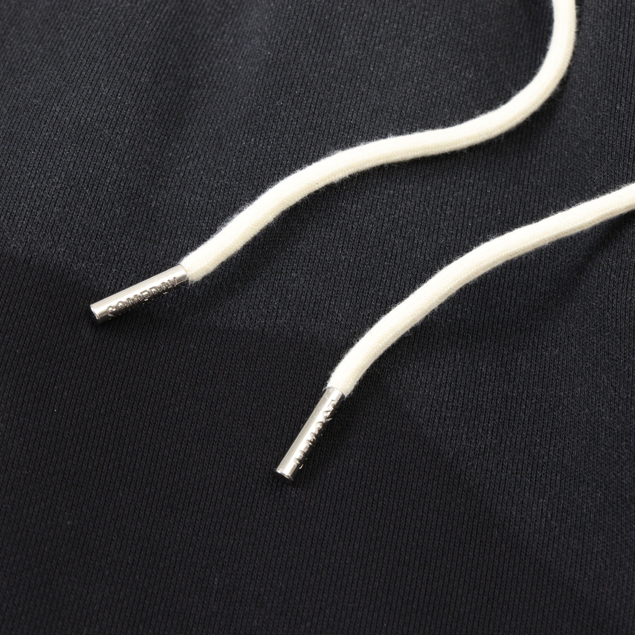 Enemies Flare Bottoms – Black – Close-up of white drawstrings with silver-tone metal tips