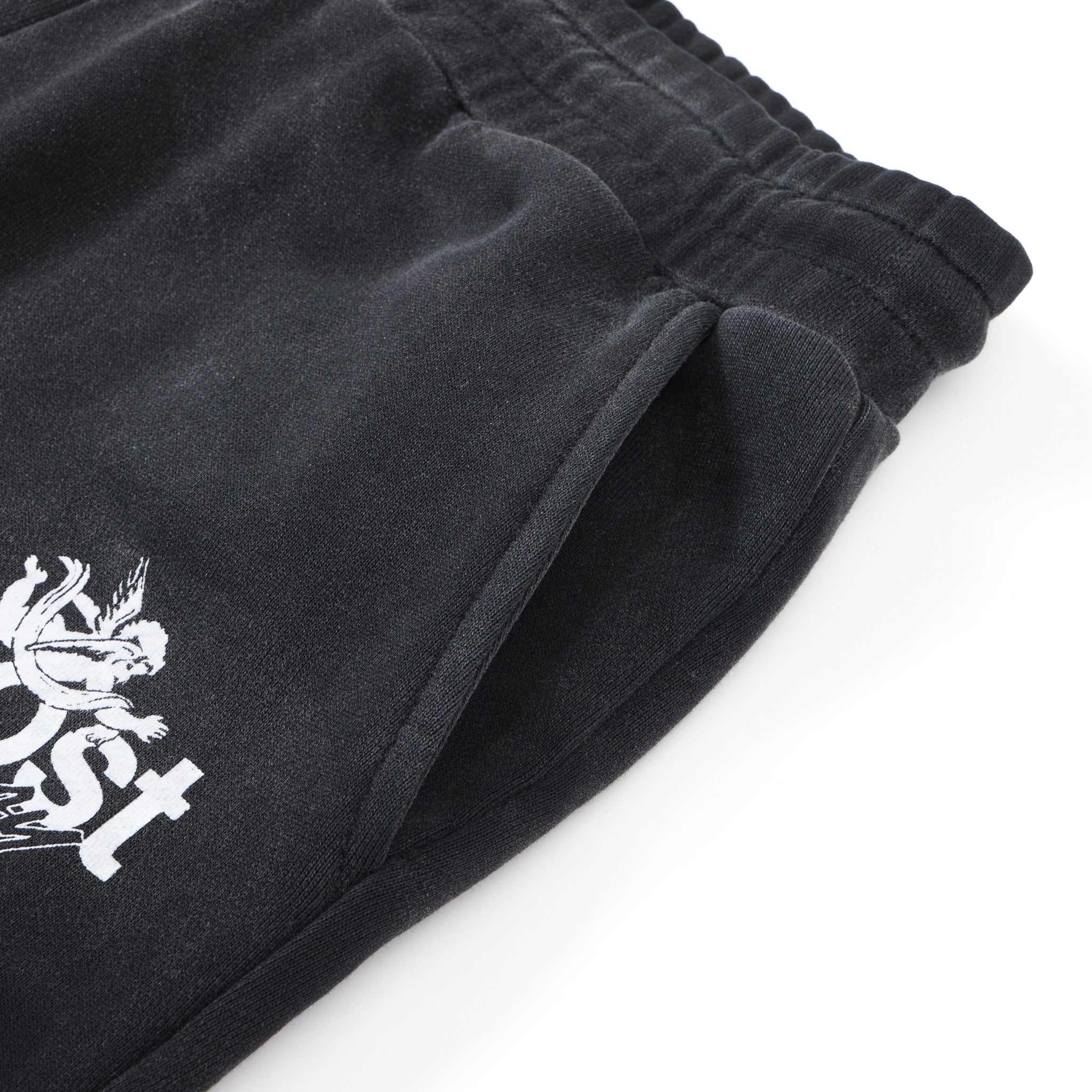 Enemies Flare Bottoms – Black – Close-up of side pocket opening, elastic waistband, and partial white logo