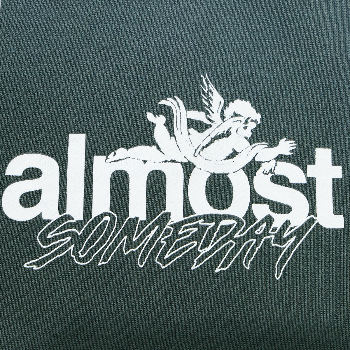 Enemies Flare Bottoms – Green – Close-up of white ALMOST SOMEDAY lettering and winged figure logo