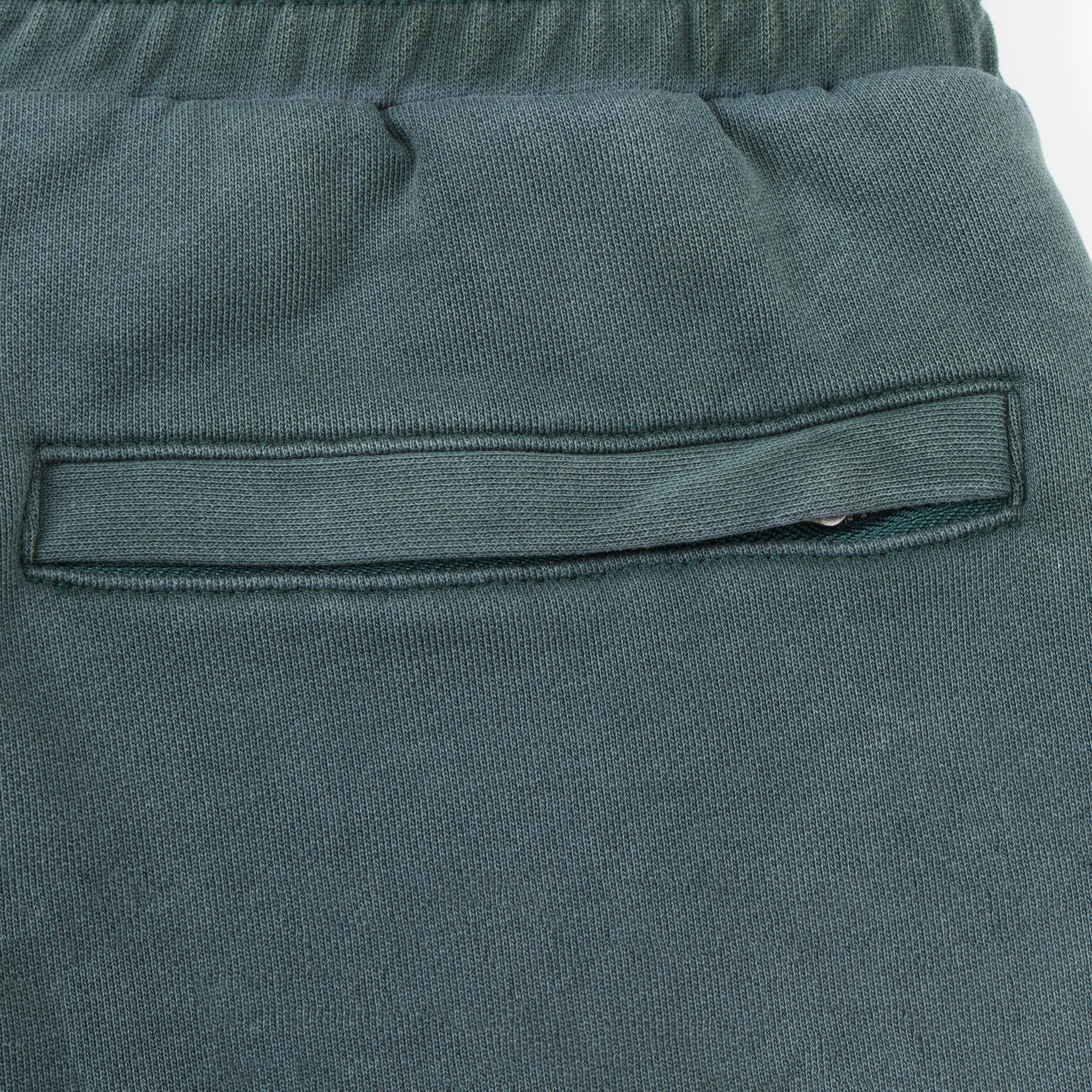 Enemies Flare Bottoms – Green – Close-up of rear welt pocket with concealed zip closure