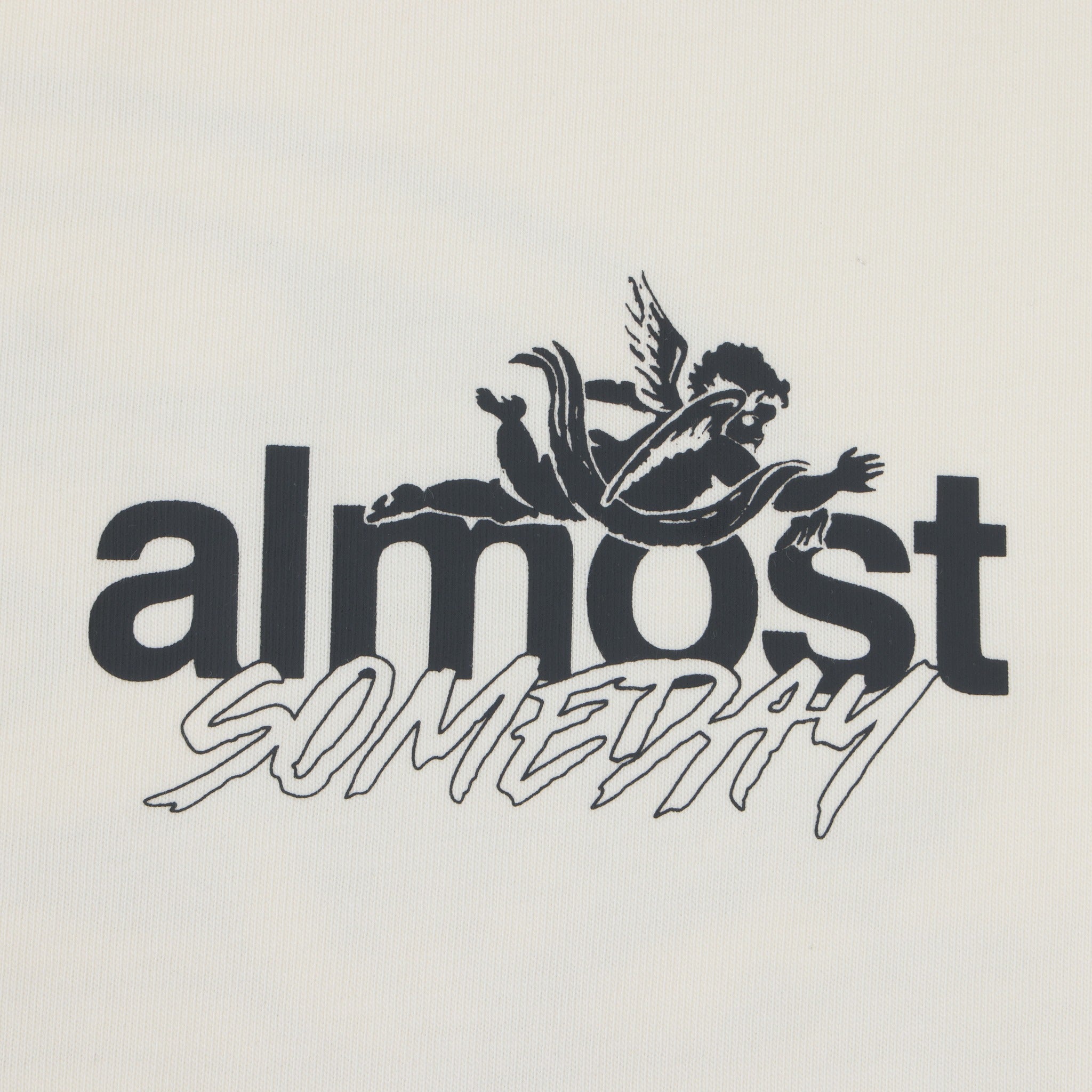 Enemies Tee – Cream – Close-up of black ALMOST SOMEDAY chest lettering and winged figure logo