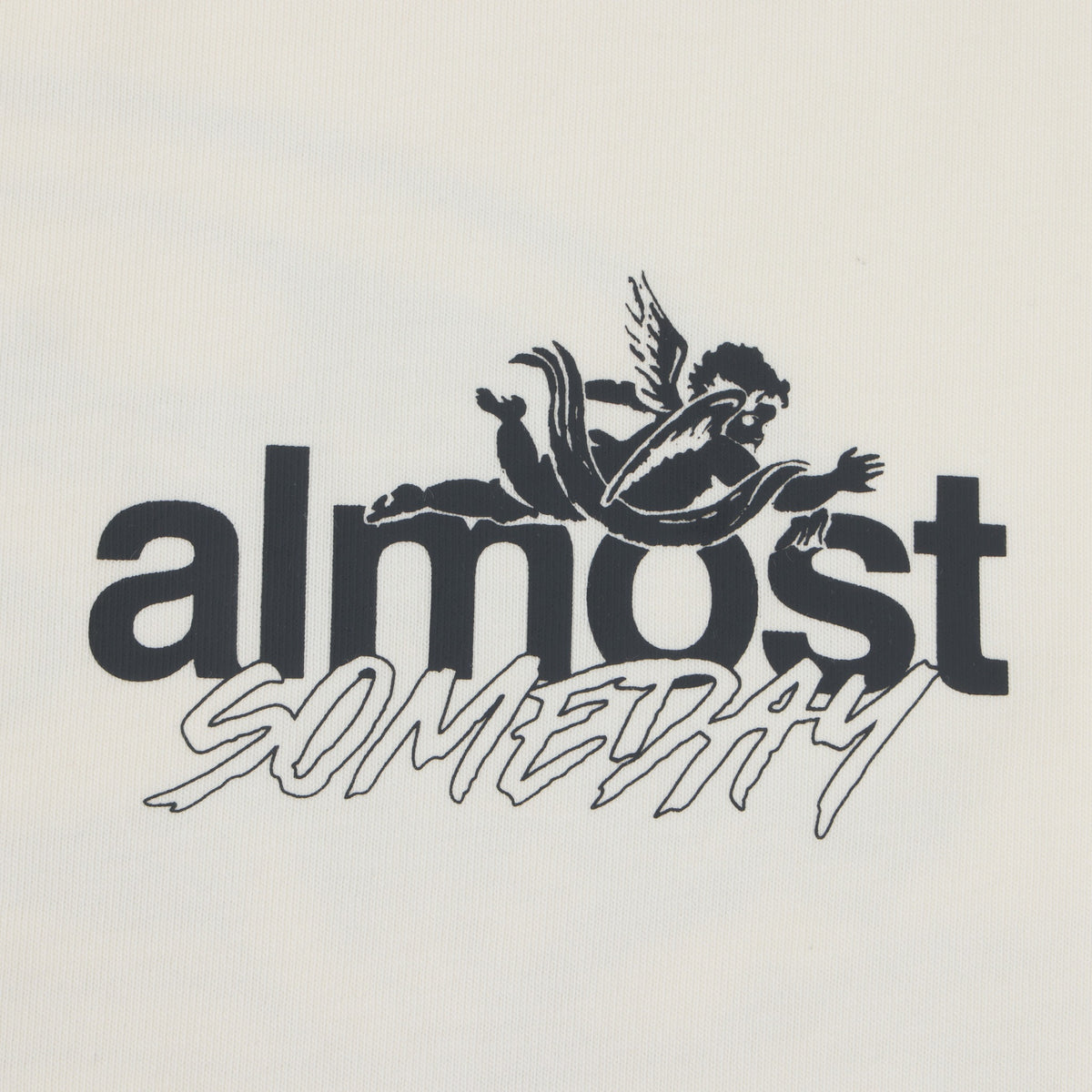 Enemies Tee – Cream – Close-up of black ALMOST SOMEDAY chest lettering and winged figure logo
