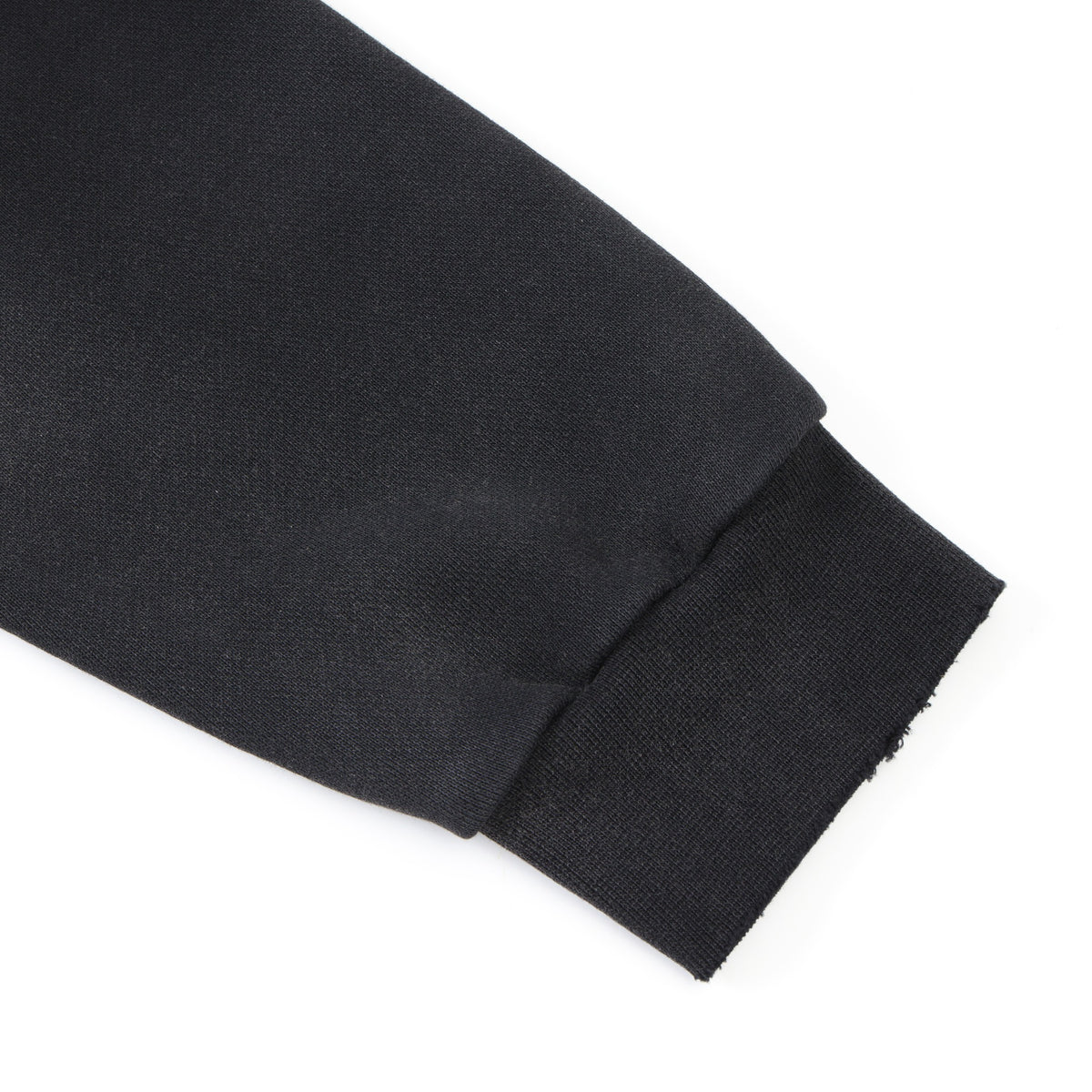 Enemies Zip Hoodie – Black – Close-up of sleeve and ribbed cuff