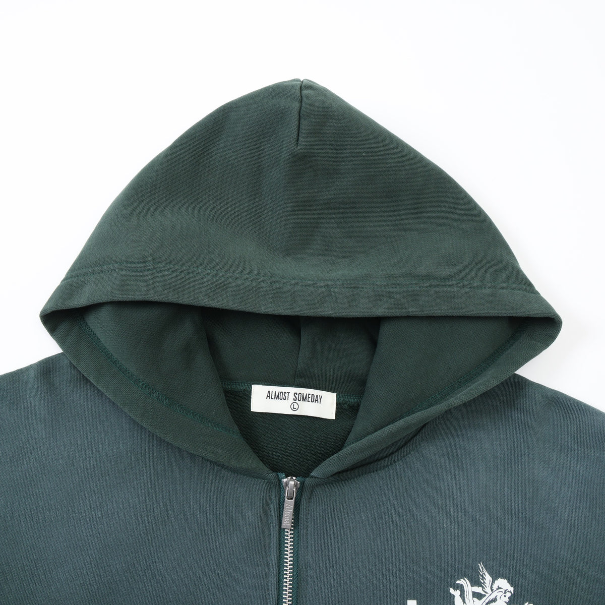 Enemies Zip Hoodie – Green – Close-up of hood, interior ALMOST SOMEDAY label, and silver-tone zipper pull