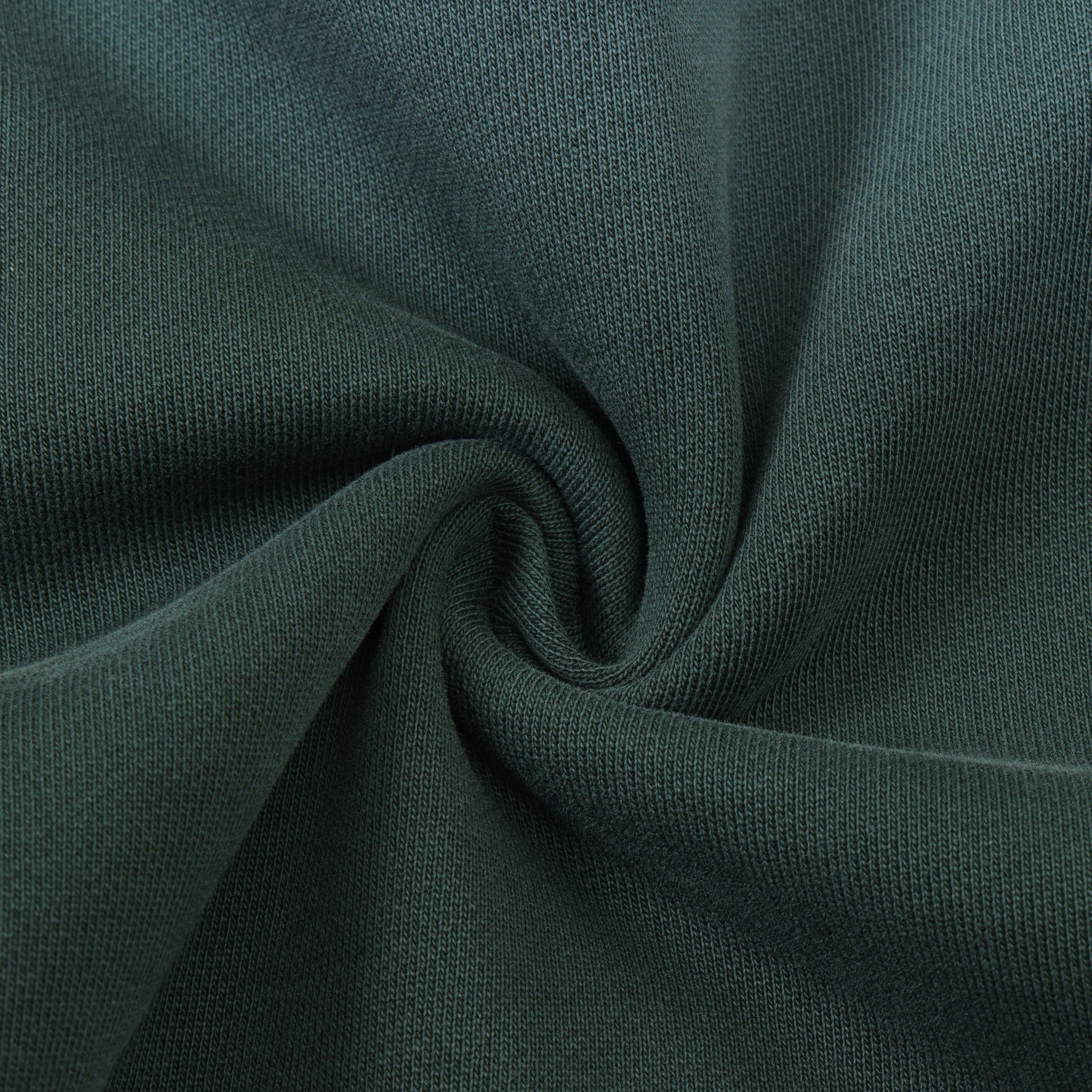 Enemies Zip Hoodie – Green – Close-up of green fabric gathered to show knit texture