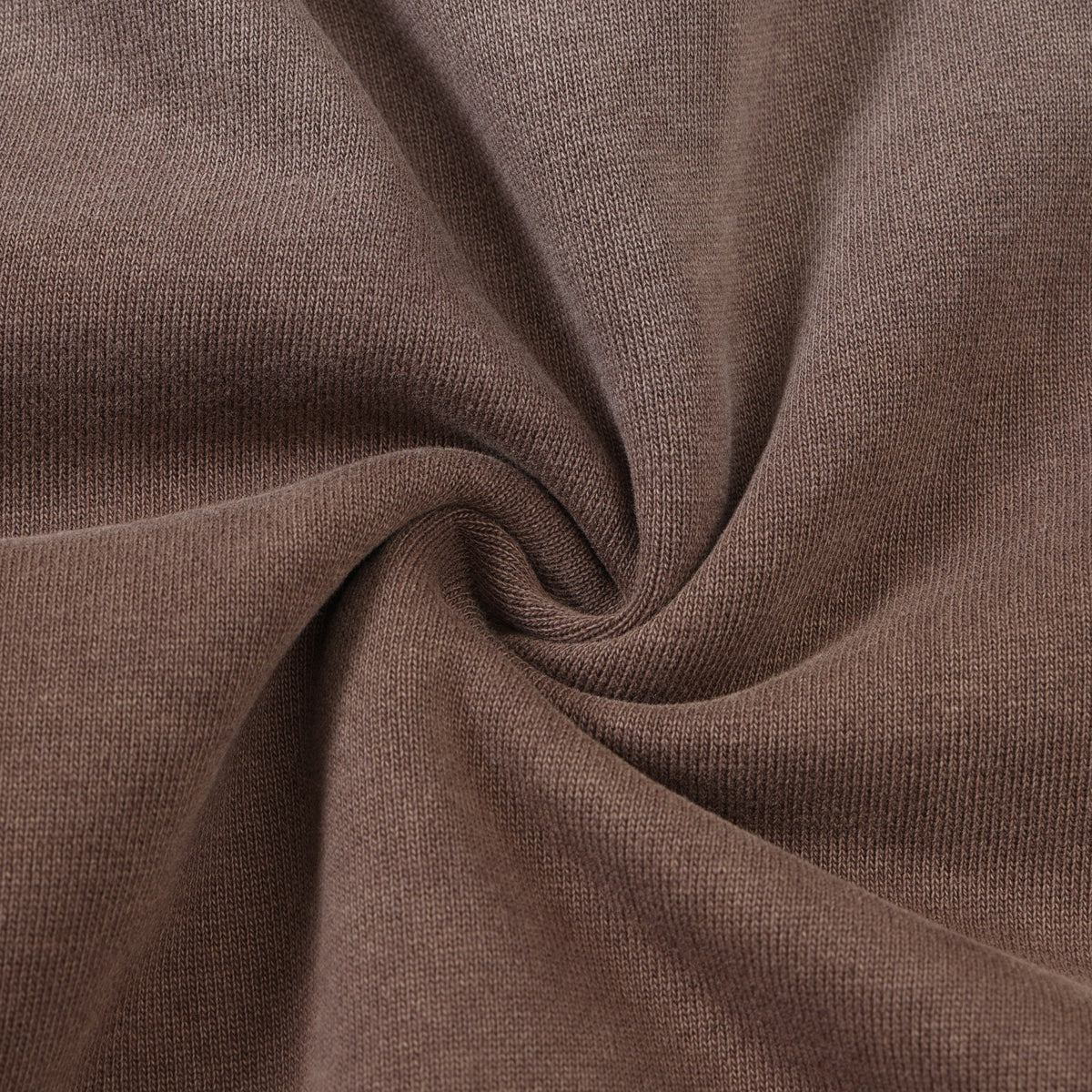 Fountain Hoodie – Brown – Close-up of gathered brown fabric showing knit texture