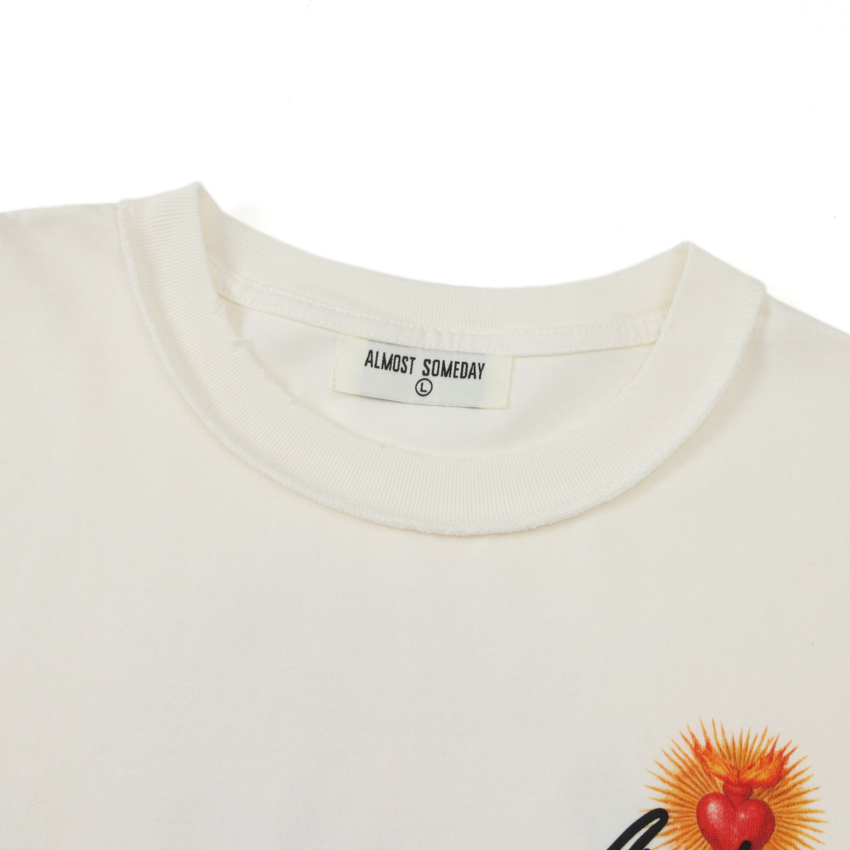 Fountain Tee – Cream – Close-up of ribbed crew neckline and ALMOST SOMEDAY size label