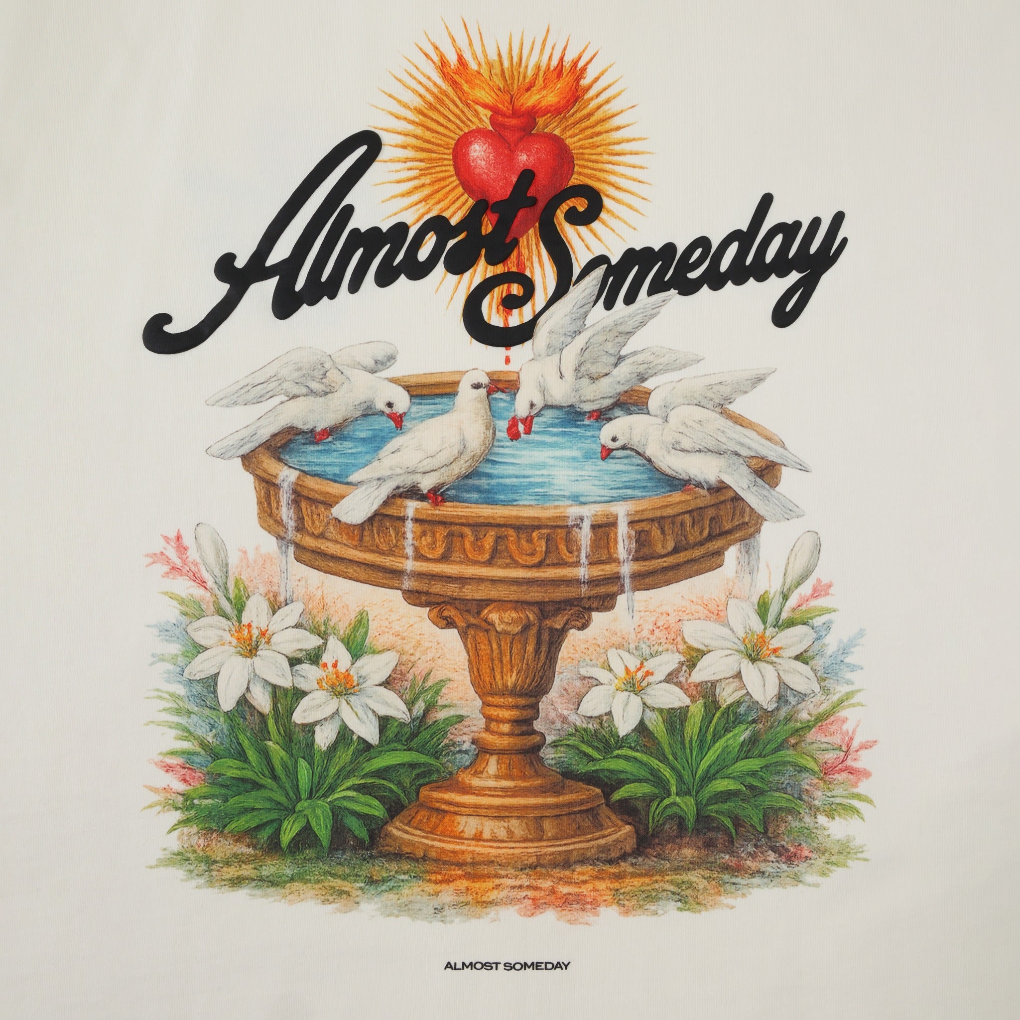 Fountain Tee – Cream – Close-up of back artwork with fountain, doves, flowers, and heart