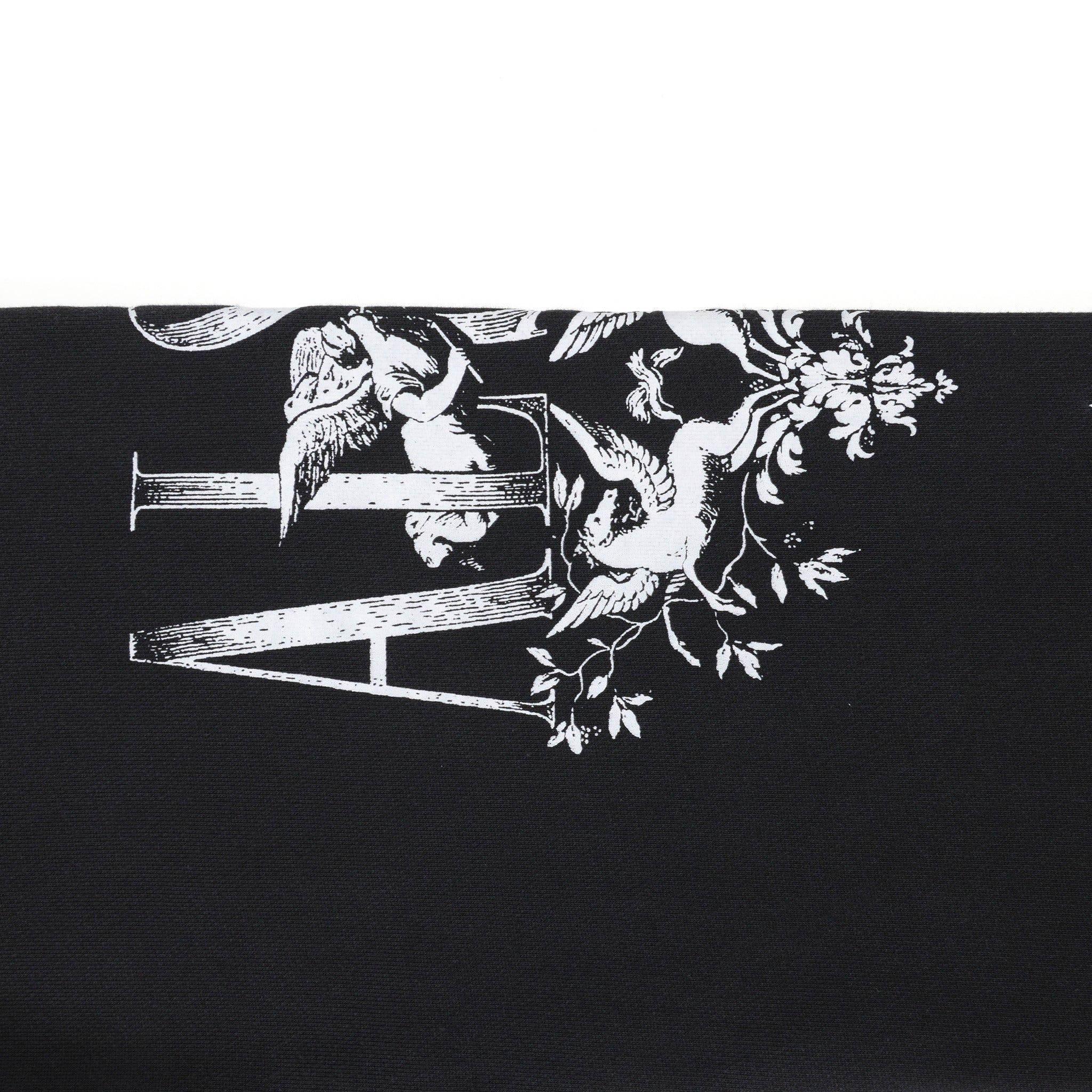 League Flare Sweatpants – Black – Close-up of white leg graphic with lettering, cherub, and winged figures