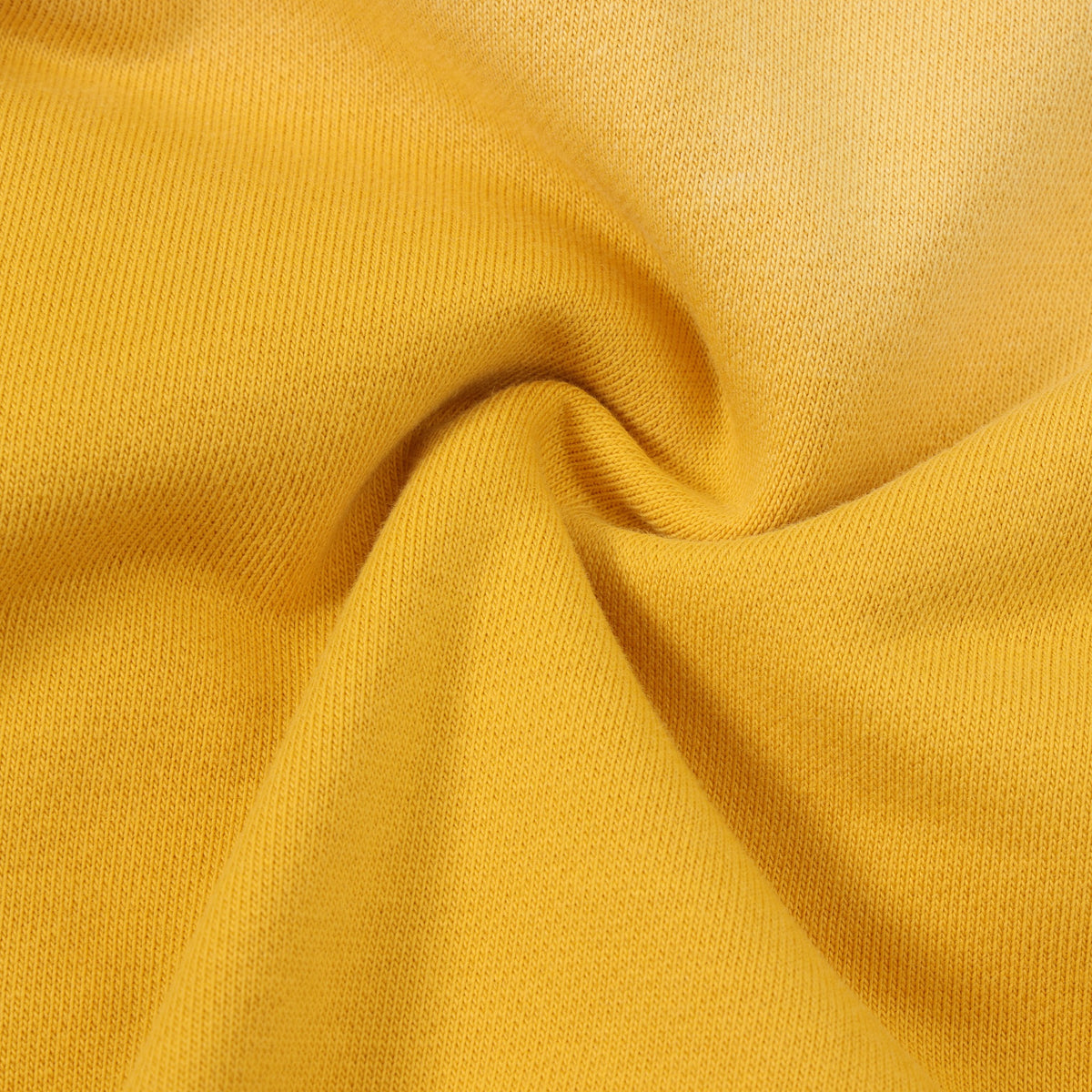League Flare Sweatpants – Yellow – Close-up of yellow fabric gathered to show texture