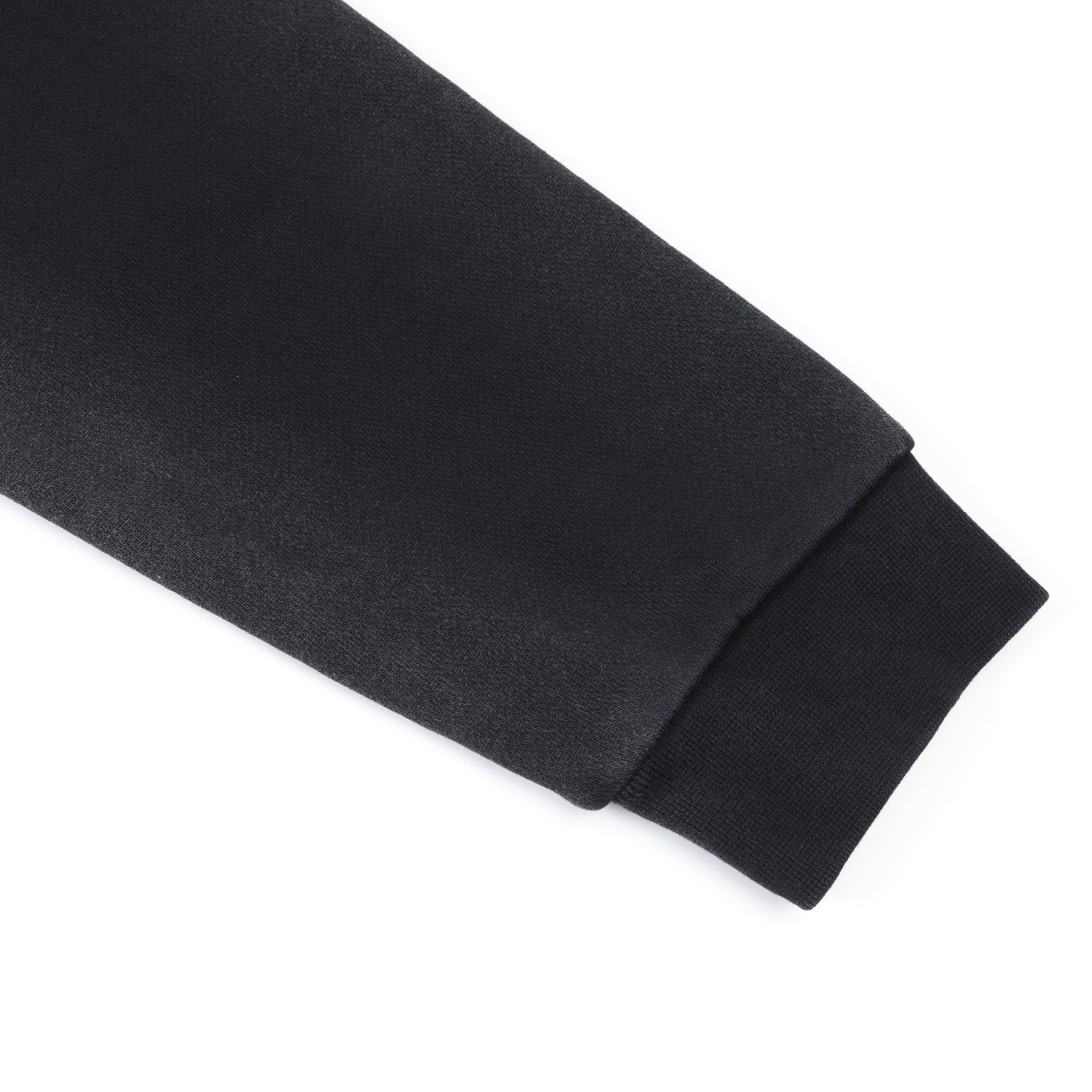 League Hoodie – Black – Close-up of sleeve and ribbed cuff