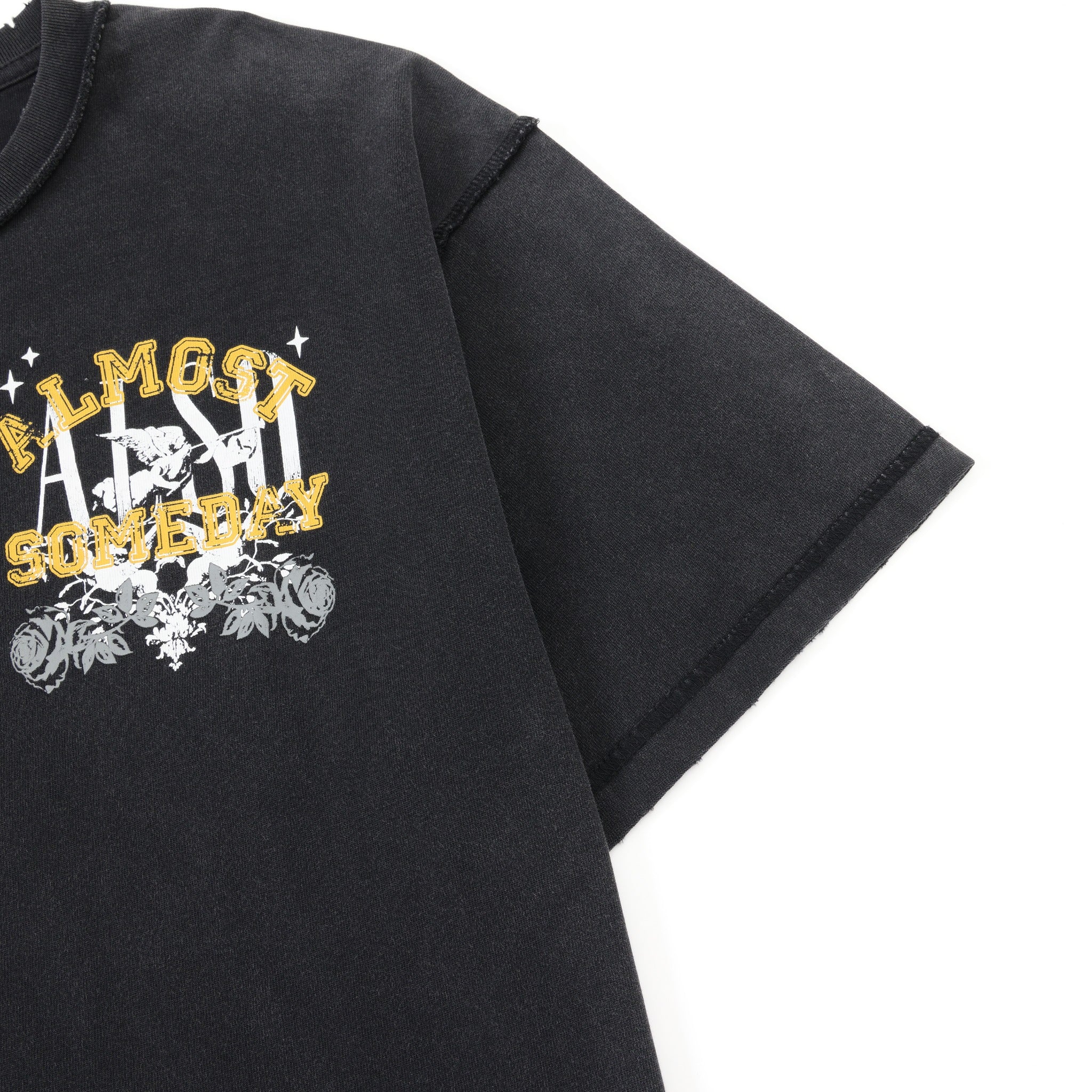League Tee – Black – Close-up of chest graphic, shoulder seam, and sleeve