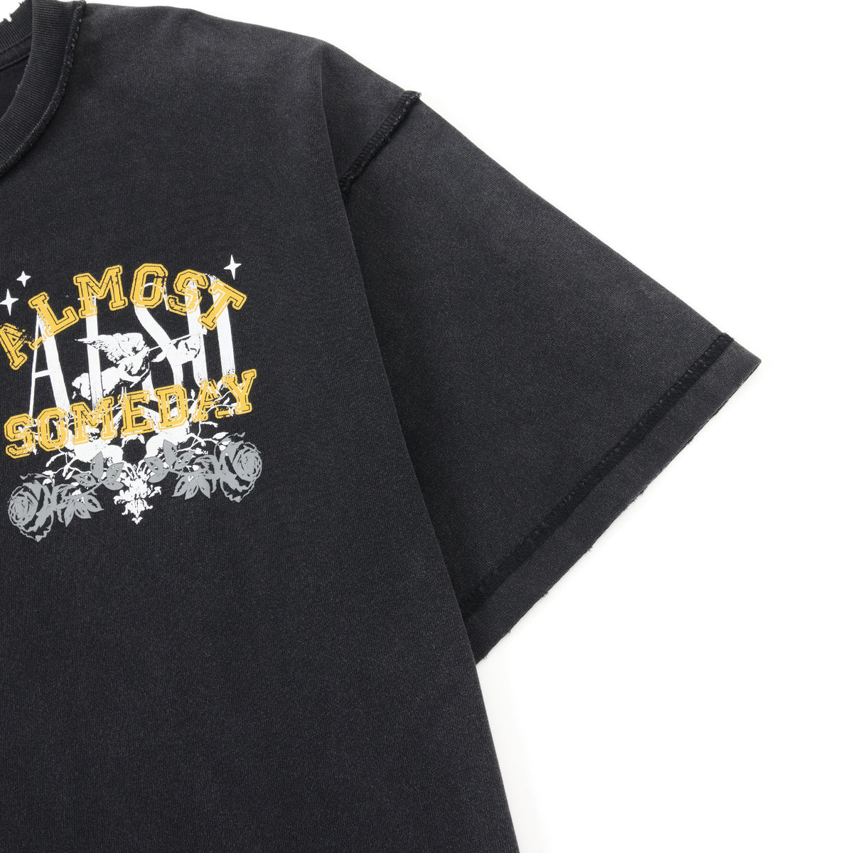 League Tee – Black – Close-up of chest graphic, shoulder seam, and sleeve